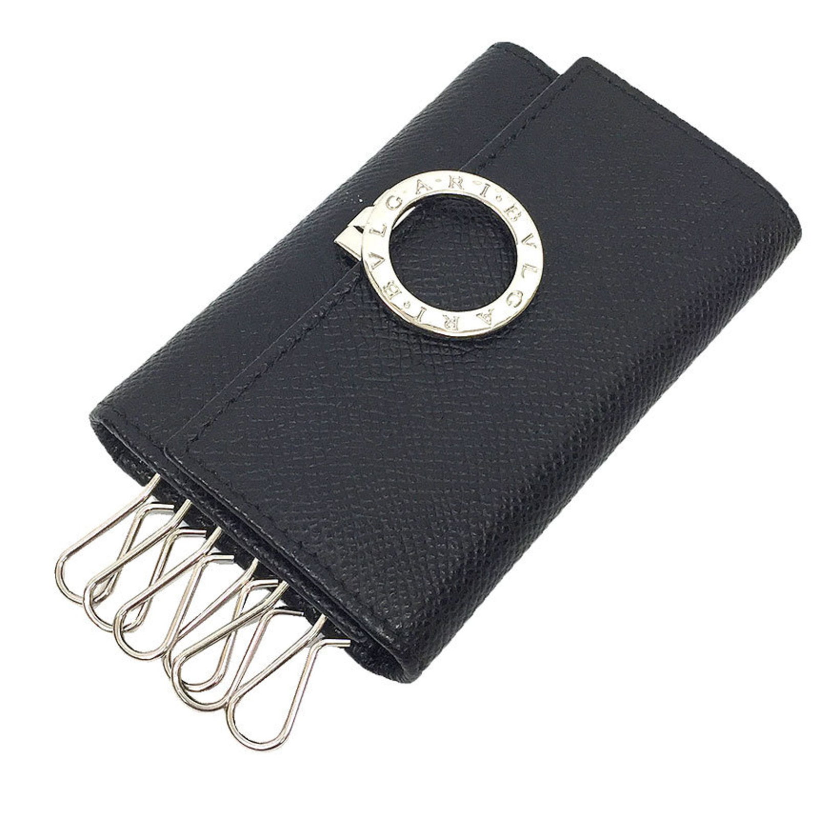 Bvlgari Keycase Brass Leather: Bvlgari Keycase Brass Leather Bvlgari Keycase Brass Leather is a sleek and sophisticated accessory featuring a black leather exterior and brass accents, measuring 7cm x 10.5cm x 2cm. The item comes in