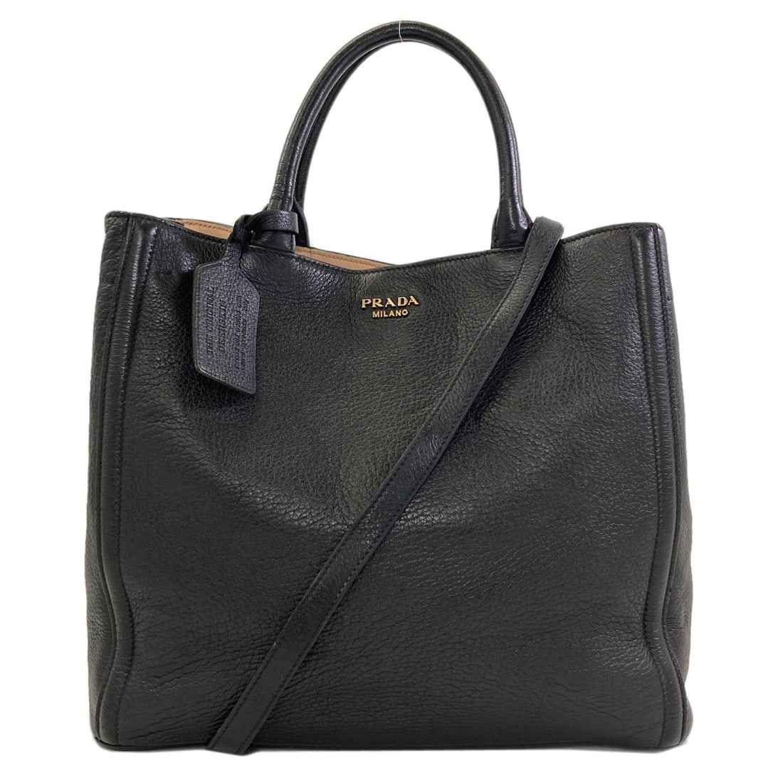 Handbag Prada 2Way Calf: Handbag Prada 2Way Calf The Prada 2Way Calf handbag features a sleek black exterior made from high-quality calf leather, showcasing a timeless design that exudes sophistication. A notable aspect of