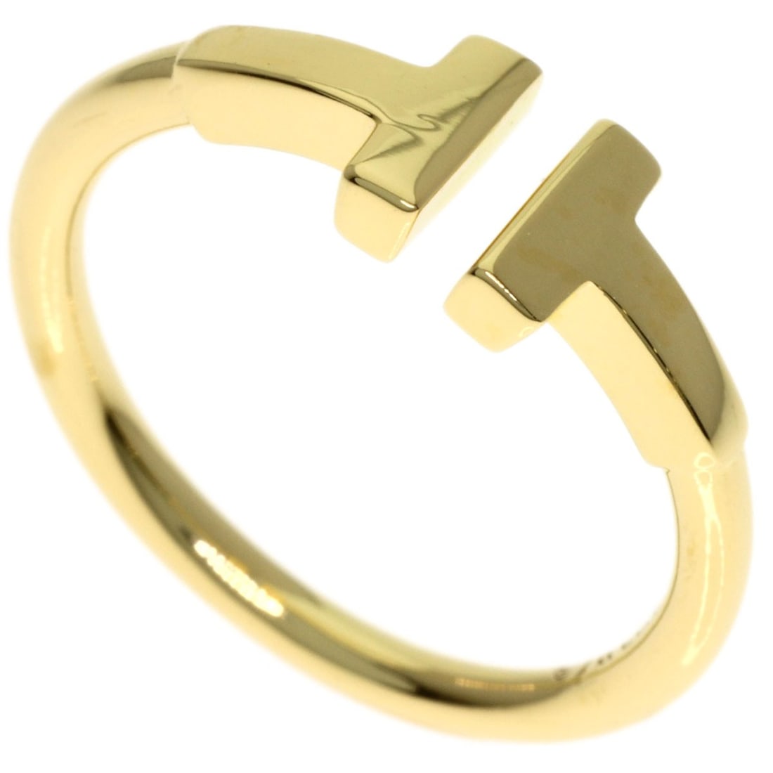 Twire Ring Tiffany&Co K18 Yellow Gold: Twire Ring Tiffany&Co K18 Yellow Gold K18 Yellow Gold Twire Ring from Tiffany&Co. This exquisite ring showcases the beauty of K18 yellow gold, a rare and luxurious metal alloy. The Twire design adds