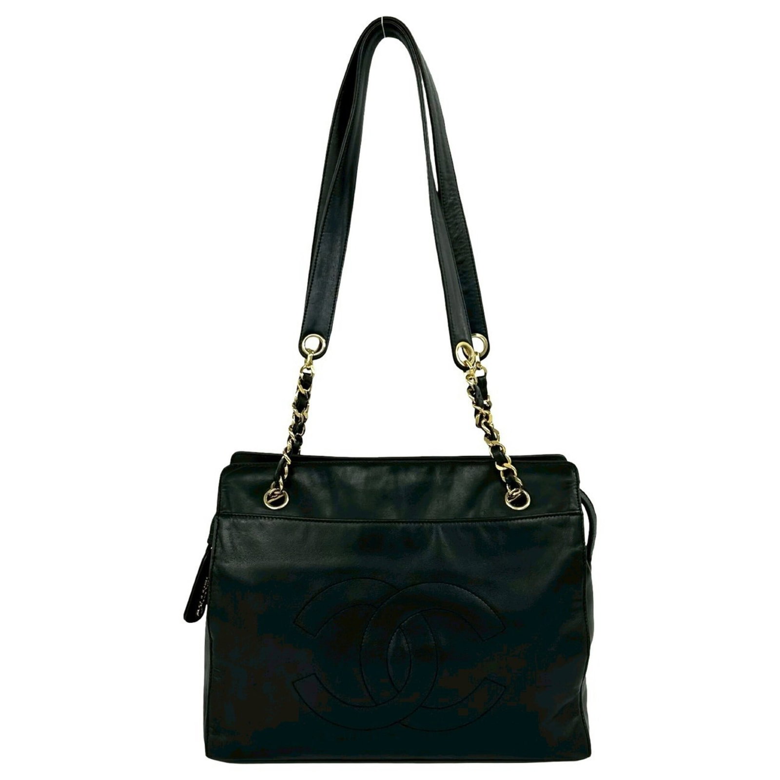 Shoulder Bag Leather Tote Bag Chanel: Shoulder Bag Leather Tote Bag Chanel Chanel's iconic shoulder bag is crafted from luxurious lambskin leather, featuring a sleek black finish. This timeless tote bag measures 26cm x 30.5cm x 8.5cm,