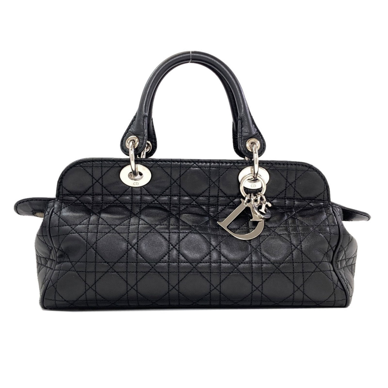Handbag Leather Dior Christian: Handbag Leather Dior Christian This luxurious handbag from Christian Dior is crafted from high-quality lambskin leather, featuring a sleek black finish. Measuring 18cm x 32cm x 14cm, it boasts a sophi