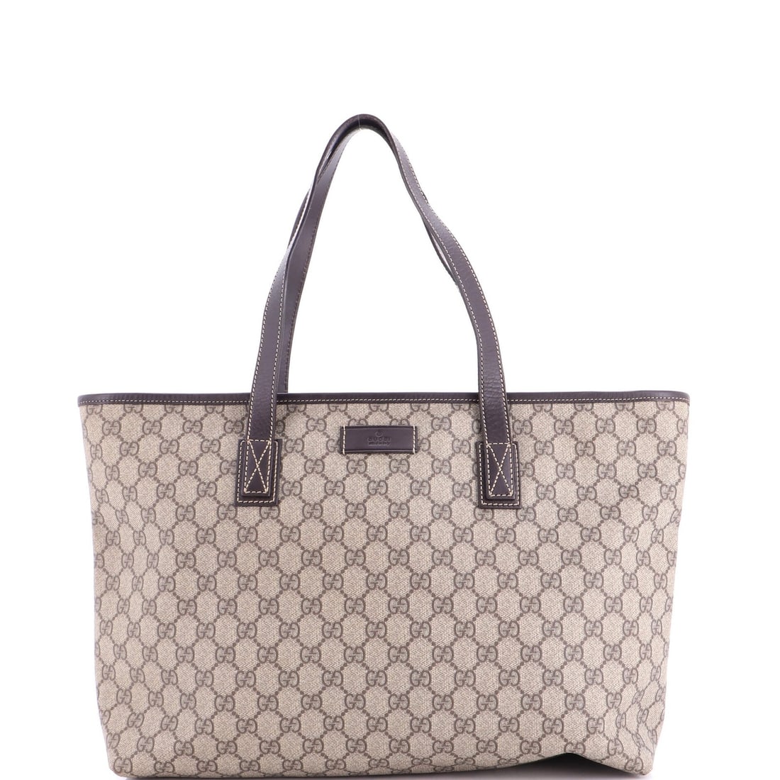 Gucci Coated Canvas Tote GG Medium Leather: Gucci Coated Canvas Tote GG Medium Leather The Gucci Coated Canvas Tote GG Medium Leather is a stylish and practical tote bag with a distinctive GG pattern. Its canvas-coated exterior features a brown