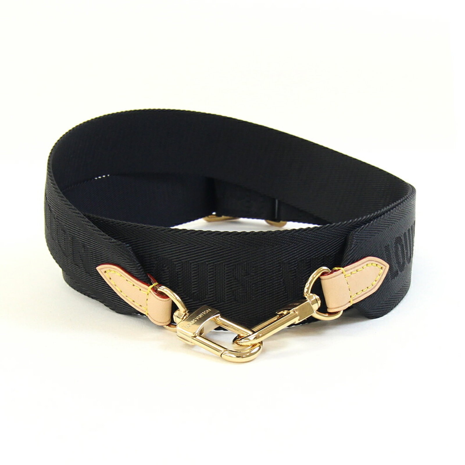 Louis Vuitton Strap Leather Metal: Louis Vuitton Strap Leather Metal Strap made from Vachetta leather, a signature material of Louis Vuitton, features a metal component and a natural handle. The strap measures 112.5cm in length. The