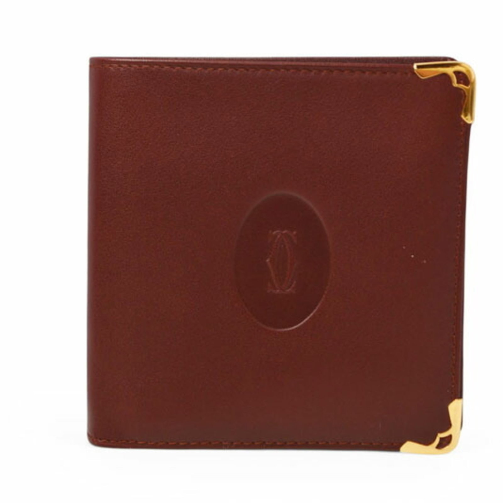 Cartier Wallet (Bi-Fold) Leather: Cartier Wallet (Bi-Fold) Leather Cartier's bi-fold leather wallet is crafted from high-quality leather, available in Bordeaux color. Measuring 10.2cm x 10.5cm x 1.5cm, it comes with a luxurious box fo