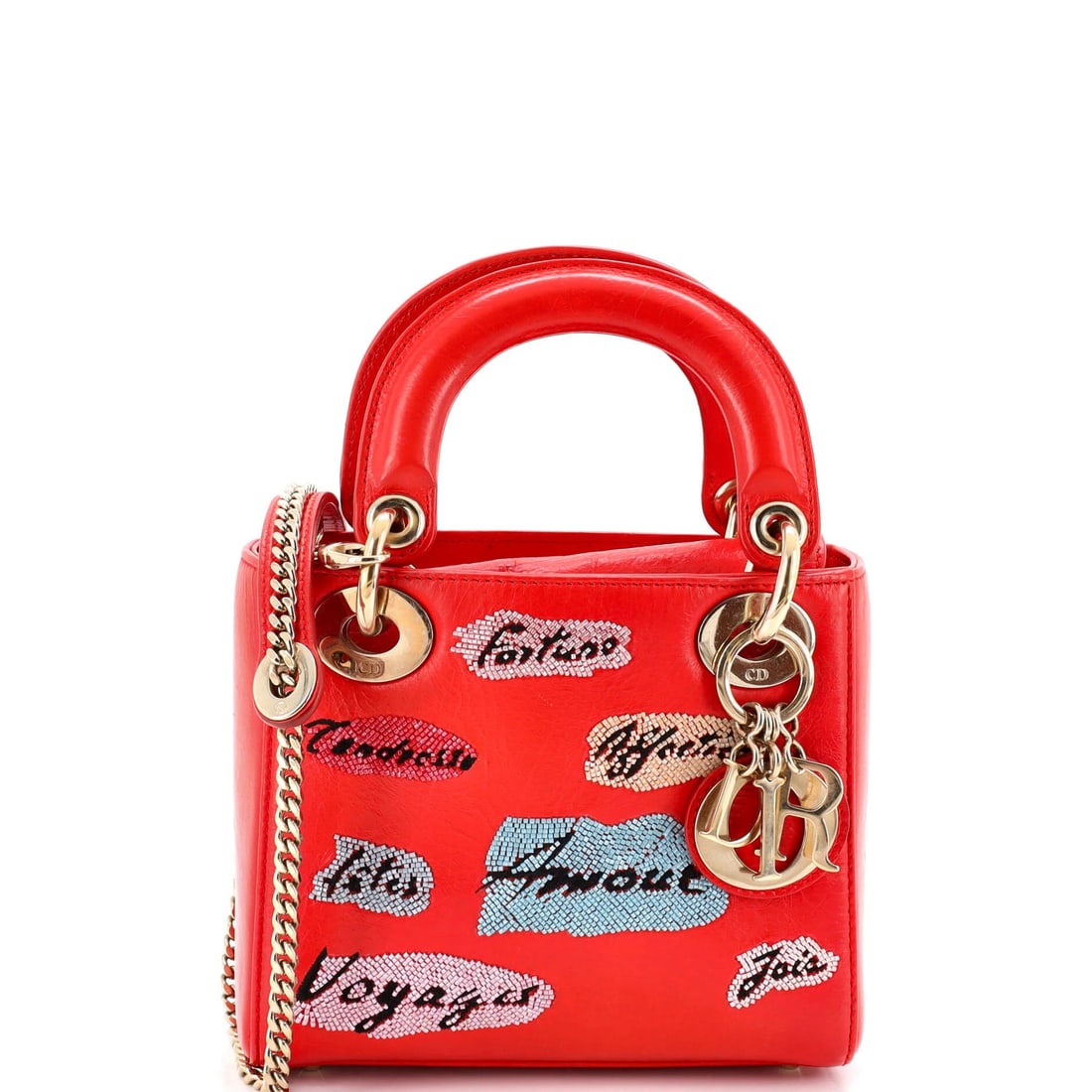 Christian Dior Lady Dior Beaded Leather Chain Mini Bag: Christian Dior Lady Dior Beaded Leather Chain Mini Bag The Christian Dior Lady Dior Beaded Leather Chain Mini Bag is a striking accessory with a bold red exterior and gold tone hardware. This mini bag