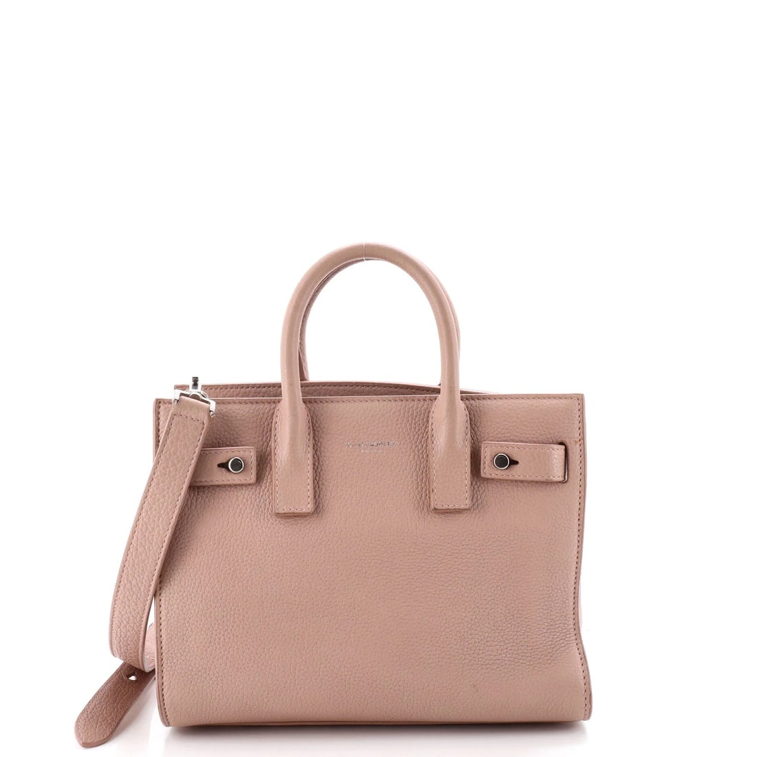 Sac de Jour Souple Bag by Saint Laurent: Sac de Jour Souple Bag by Saint Laurent The Sac de Jour Souple Bag by Saint Laurent is a stylish and versatile tote, featuring a sleek pink leather exterior with suede interior. Measuring 7" in