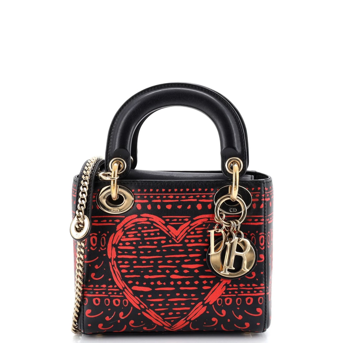 Lady Dior Bag Mini Leather Printed By Christian Dior: Lady Dior Bag Mini Leather Printed By Christian Dior Miniature Leather Lady Dior Bag with Printed Design, Black Exterior and Suede Interior, Measuring 5.5" x 6.5" x 3". This mini leather tote