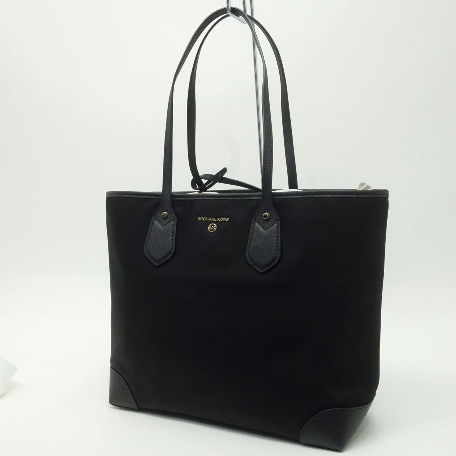 Kors Tote Bag: Kors Tote Bag Michael Kors Tote Bag - 31cm x 35cm x 13cm, perfect for everyday use with its spacious interior and stylish design. The bag's compact size makes it easy to carry, while its classic