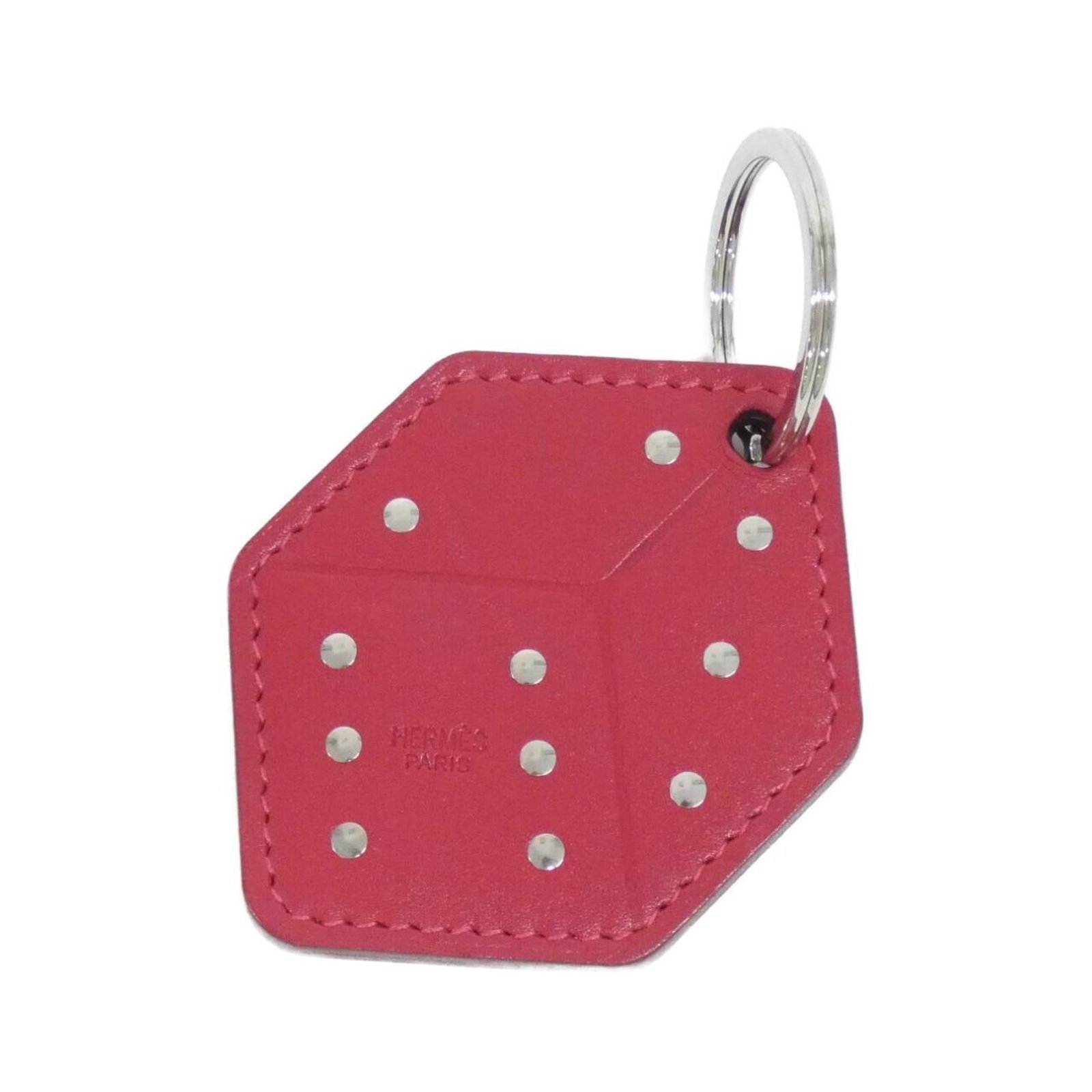 Keyring Hermes: Keyring Hermes Red color Rouge vif Hermes keyring, a stylish accessory for everyday use. Made from high-quality materials, this keyring features a bold red hue that adds a pop of color to any outfit. 