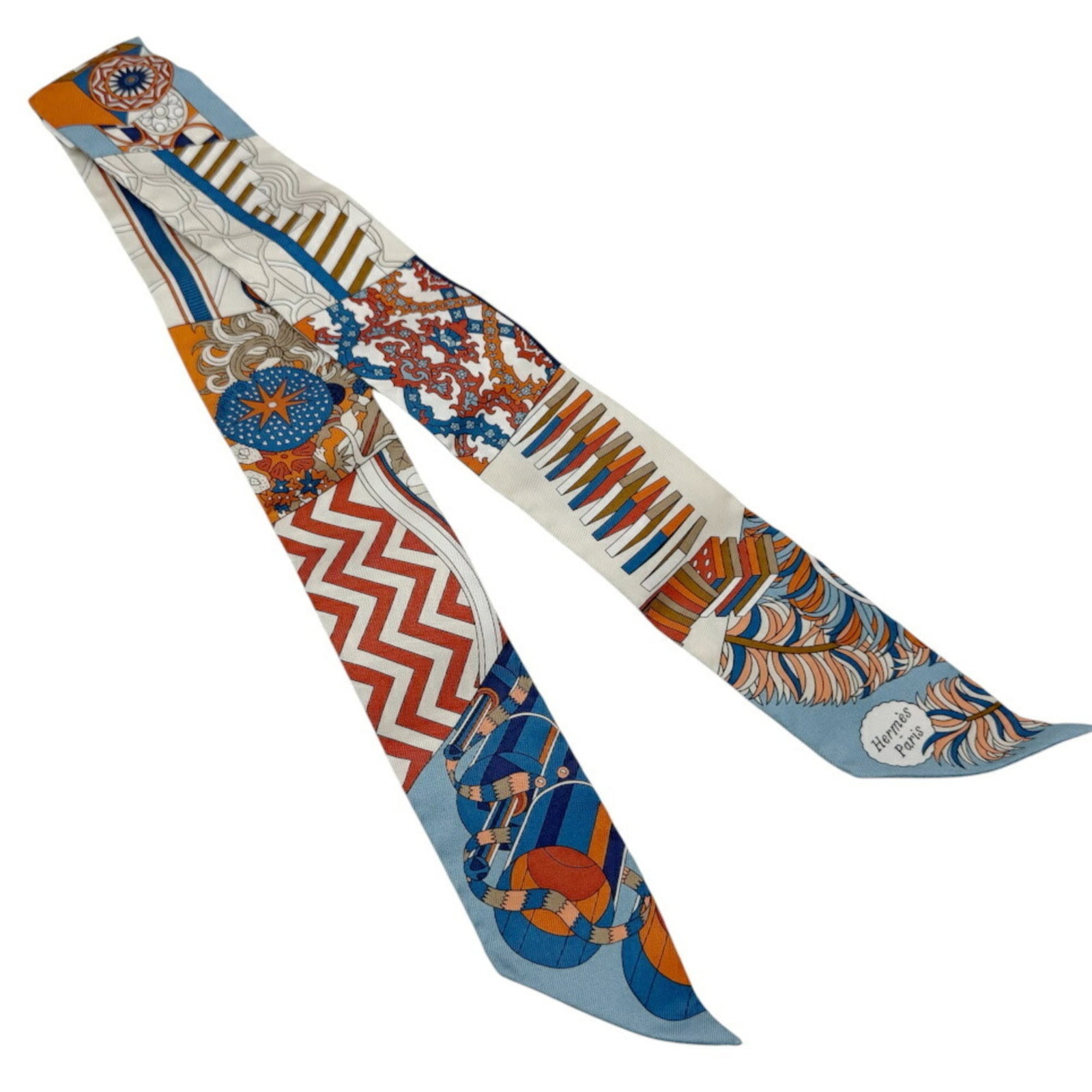 Silk Hermes Scarf 100: Silk Hermes Scarf 100 Silk Hermes Twilly Scarf in vibrant blue and orange hues, crafted from 100% high-quality silk. Measuring 85cm x 5cm, this compact scarf boasts a unique and elegant design. Made f