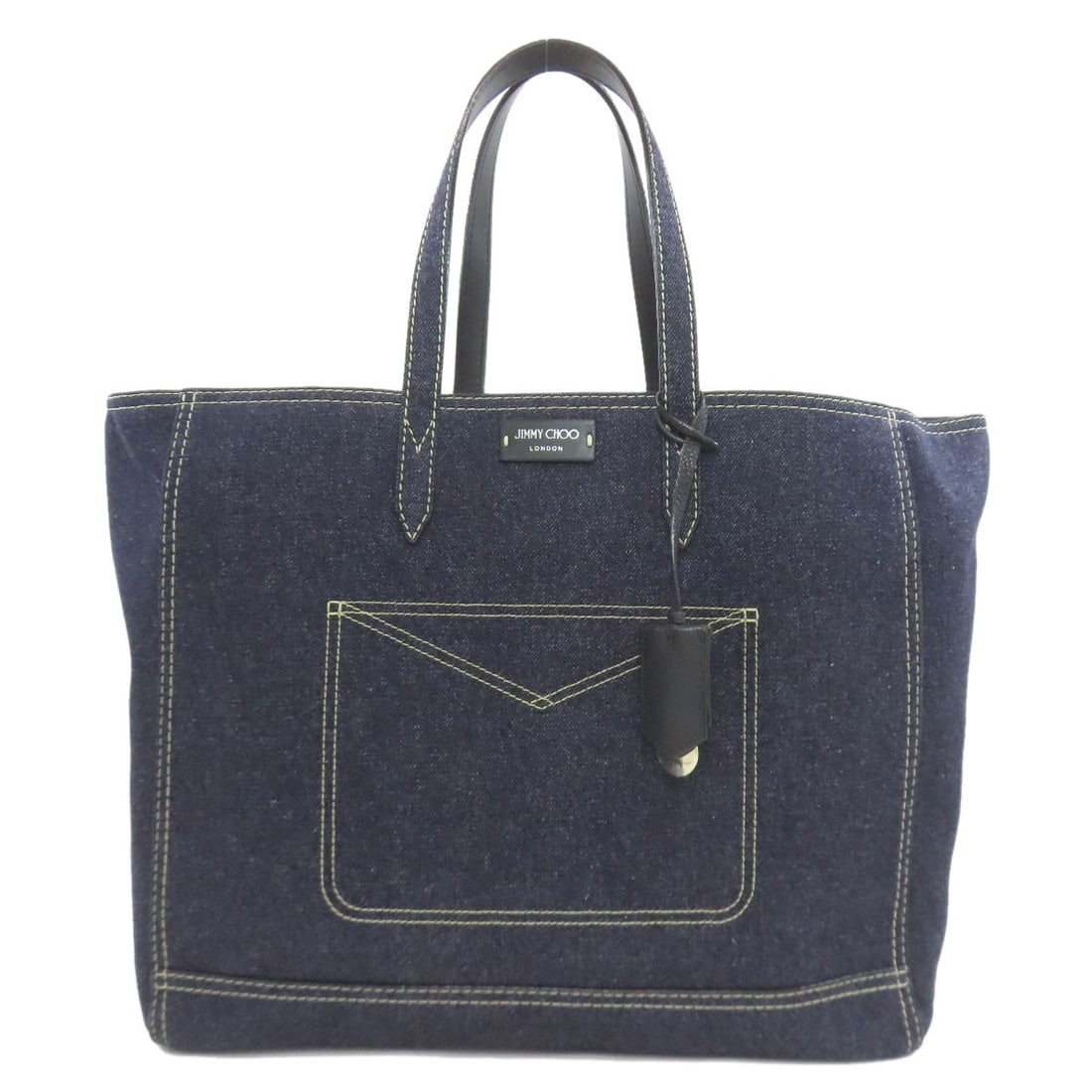 Logo tote bag denim from Jimmy Choo: Logo tote bag denim from Jimmy Choo Blue denim tote bag from Jimmy Choo, featuring a classic style with a blue exterior. Made from denim, this bag offers a stylish and casual option. The blue color