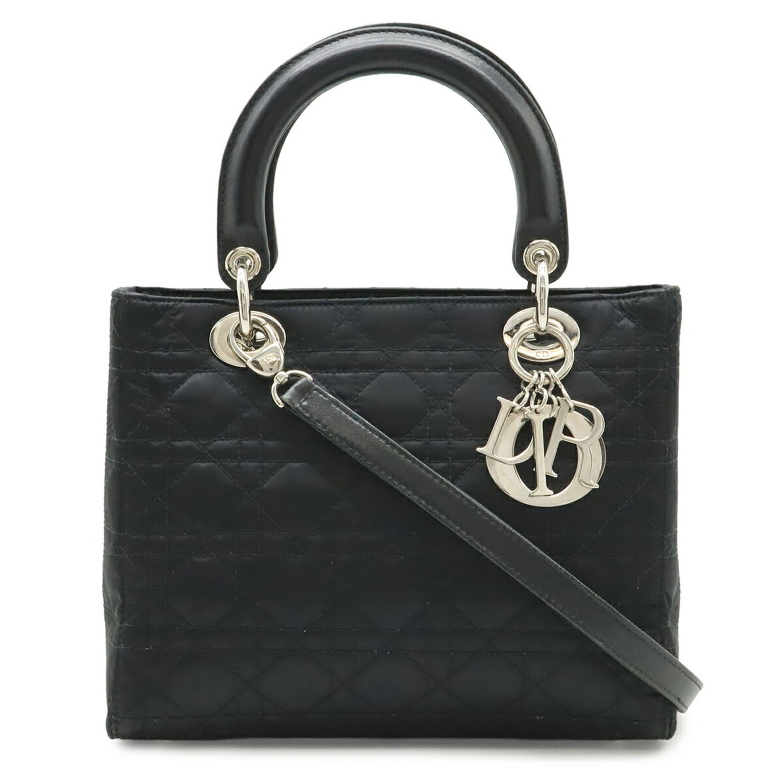 Satin Leather Christian Dior Handbag Shoulder Bag: Satin Leather Christian Dior Handbag Shoulder Bag Satin Leather Christian Dior Lady Dior Shoulder Bag in Black. This luxurious shoulder bag features satin leather and a sleek design, measuring 19.5cm