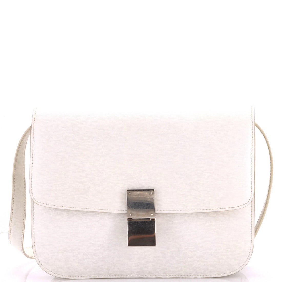 Classic Box Bag Grainy Leather Medium Celine: Classic Box Bag Grainy Leather Medium Celine The Classic Box Bag in grainy leather features a timeless design with a medium size and adjustable strap. With its white exterior and interior, this bag