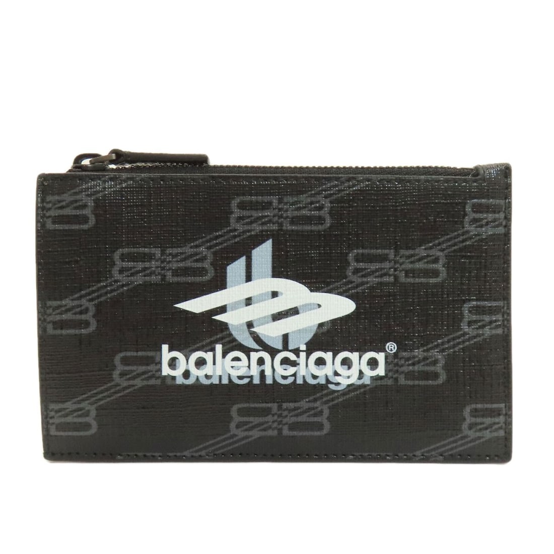 Coin purse pvc logo print balenciaga 640535: Coin purse pvc logo print balenciaga 640535 Black PVC coin purse with Balenciaga 640535 logo print. This iconic design features a sleek and modern aesthetic, making it a stylish accessory for