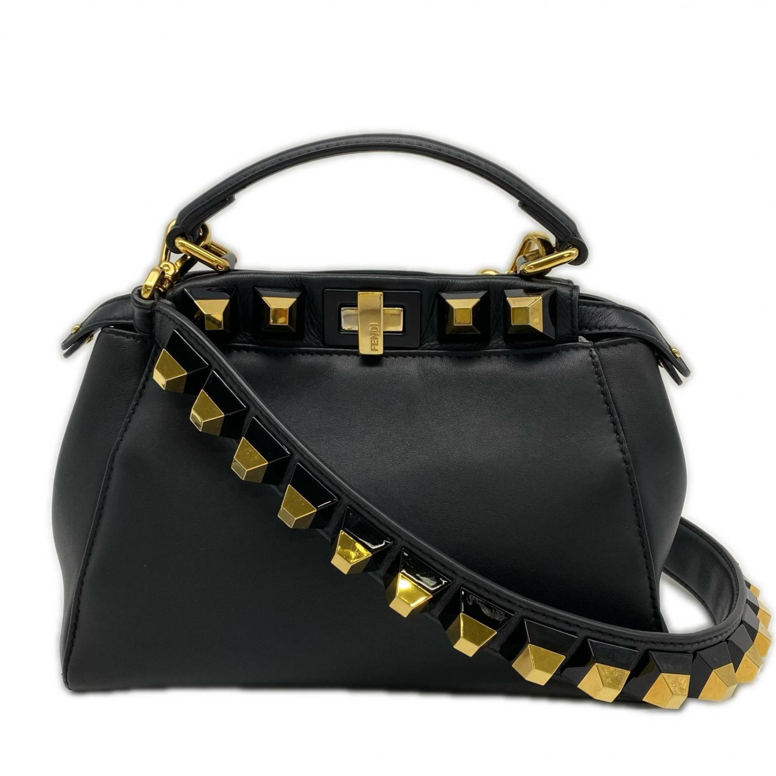 Handbag Leather Fendi: Handbag Leather Fendi Black Fendi handbag made from high-quality leather, measuring 16cm x 23cm x 11cm, with a sleek and sophisticated design. This Italian-made bag is a stylish accessory for women.
