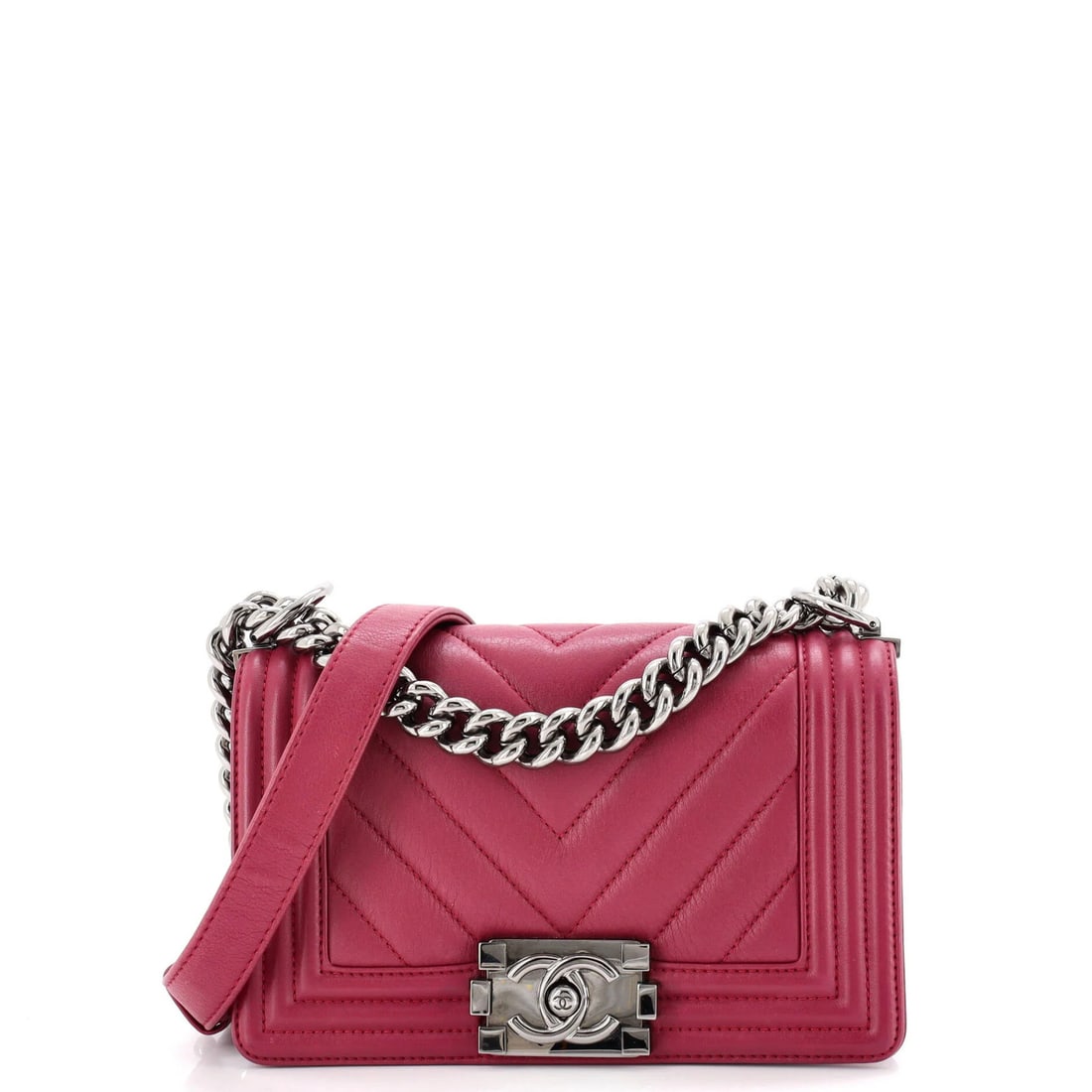 Chanel Boy Flap Bag Chevron Calfskin Small: Chanel Boy Flap Bag Chevron Calfskin Small Pink Chevron Calfskin Small Chanel Boy Flap Bag with minor scuffs and creases, featuring a classic cross-body design and silver hardware. The interior