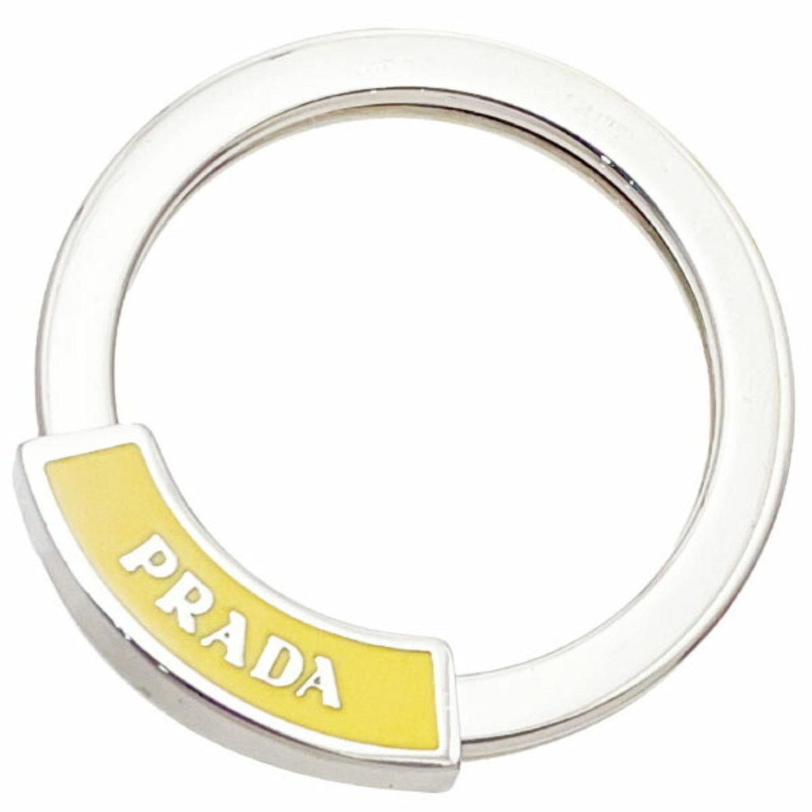 Keyring Prada: Keyring Prada Silver and yellow Prada keyring, 3.8cm in diameter, comes with a box. Item Specifics: Brand: Prada Type: Keyring Color: Silver, Yellow Ring Diameter: 3.8cm / 1.49'' Accessories: Box Prod