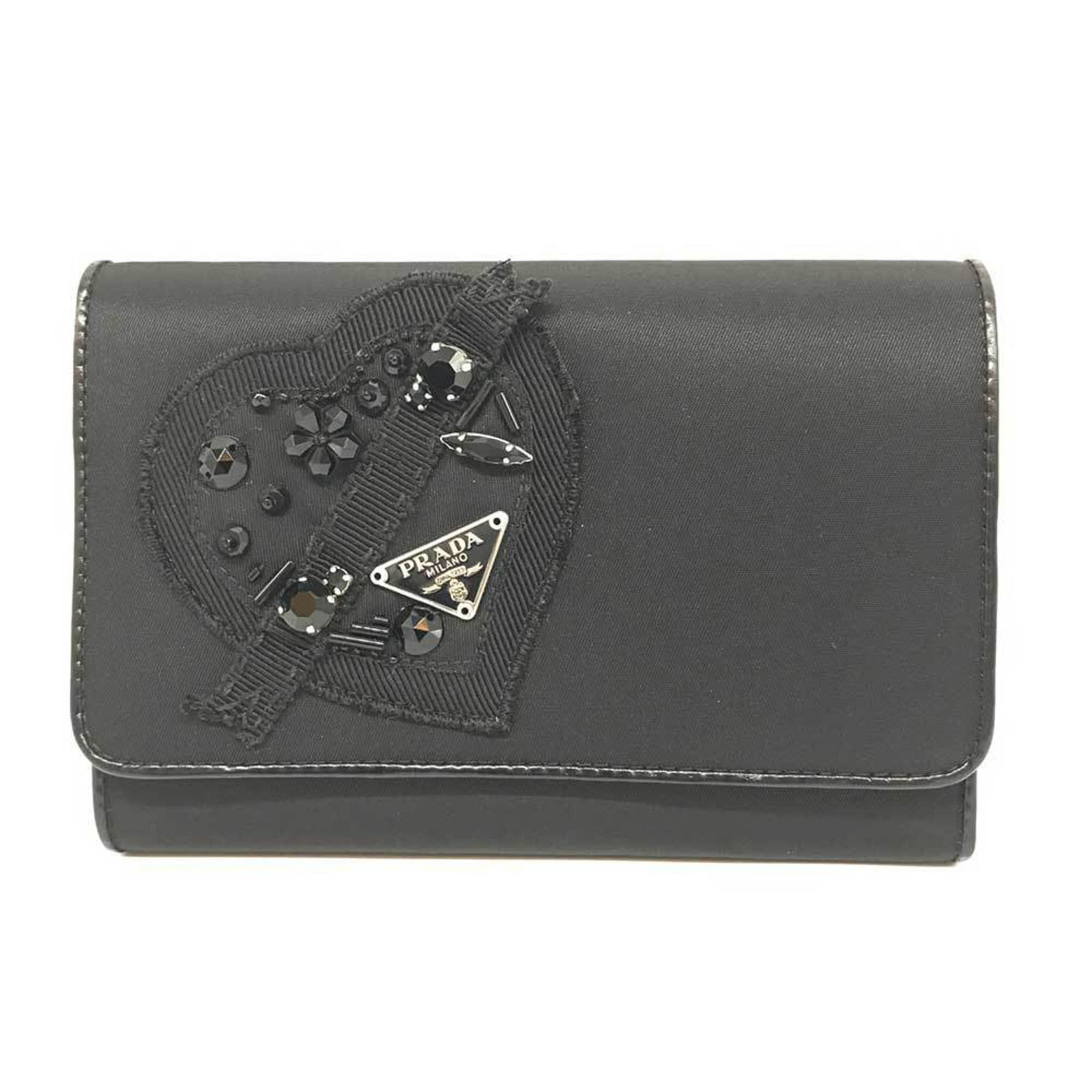 Nylon Prada Wallet Bi Fold: Nylon Prada Wallet Bi Fold Nylon Prada Wallet Bi Fold is made from durable nylon material, featuring a sleek black design. The bi-fold wallet measures 10cm x 15cm x 2cm and comes with a box for