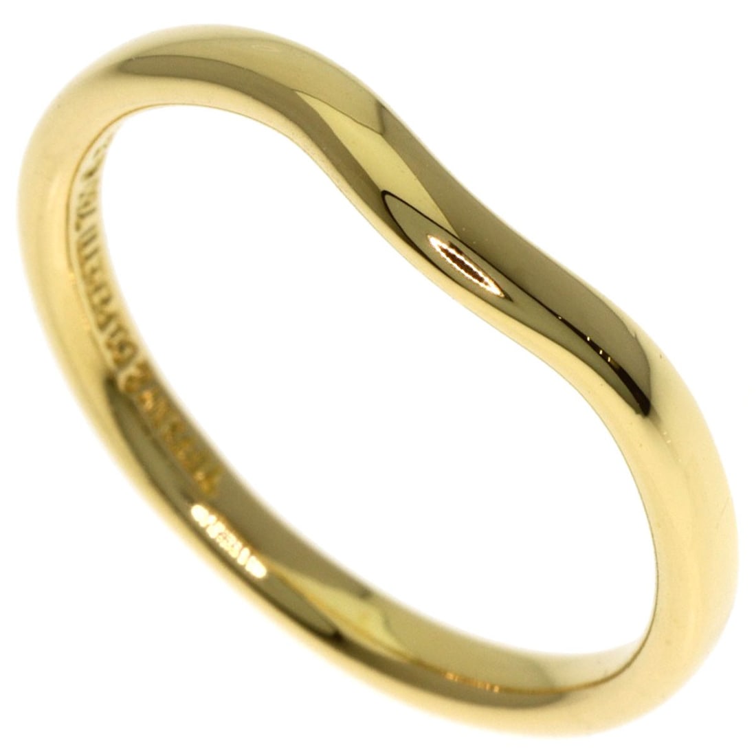 Tiffany&Co Curved Gold K18 Yellow Ring Band: Tiffany&Co Curved Gold K18 Yellow Ring Band K18 Yellow Gold Curved Ring Band from Tiffany&Co. Features a sleek, curved design made from 18K Yellow Gold, with a ring size of 5.25(US). This stylish