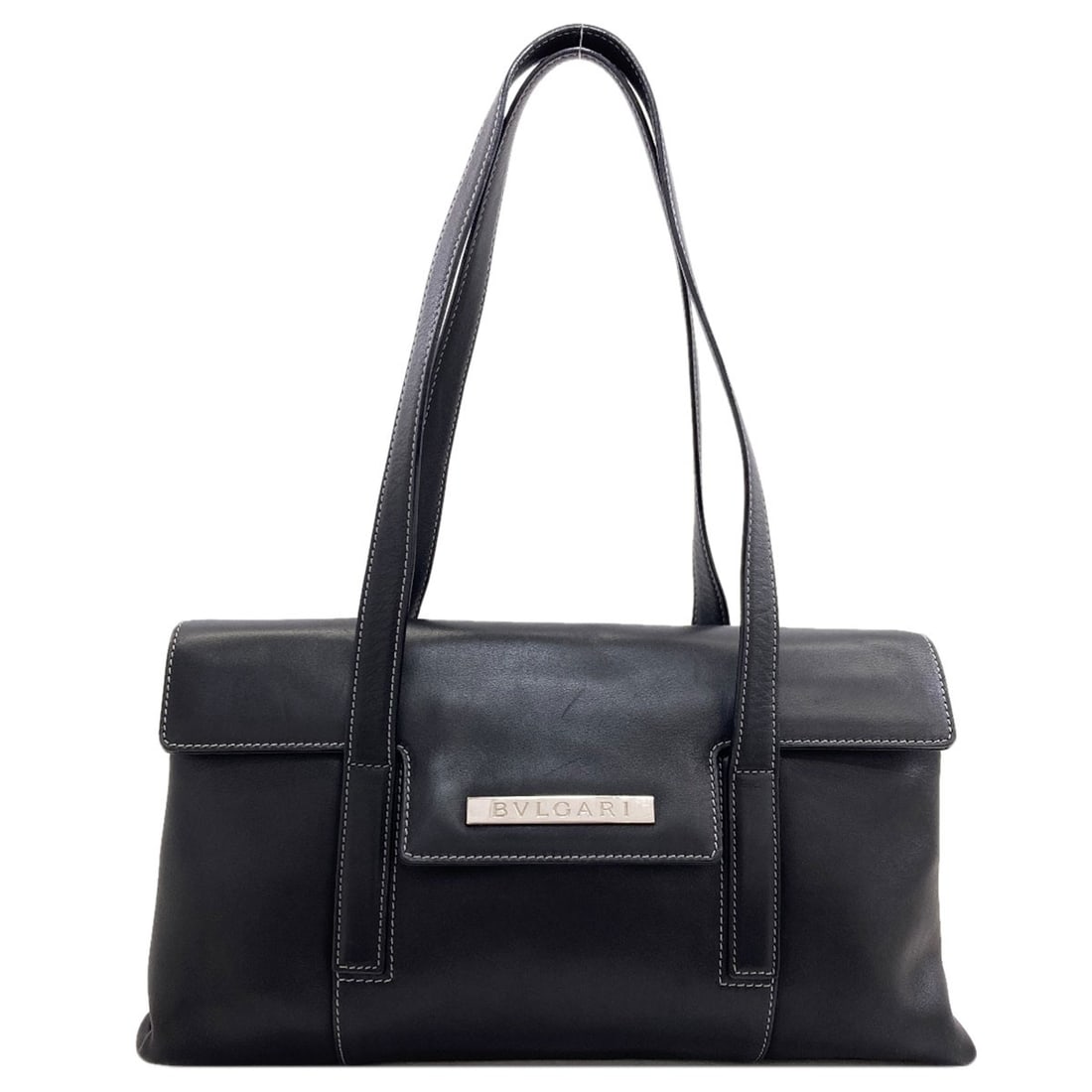 Logo Handbag Leather: Logo Handbag Leather Black leather handbag from BVLGARI, bearing the brand's signature style and color. Made from high-quality leather, this handbag is a classic design that exudes sophistication and