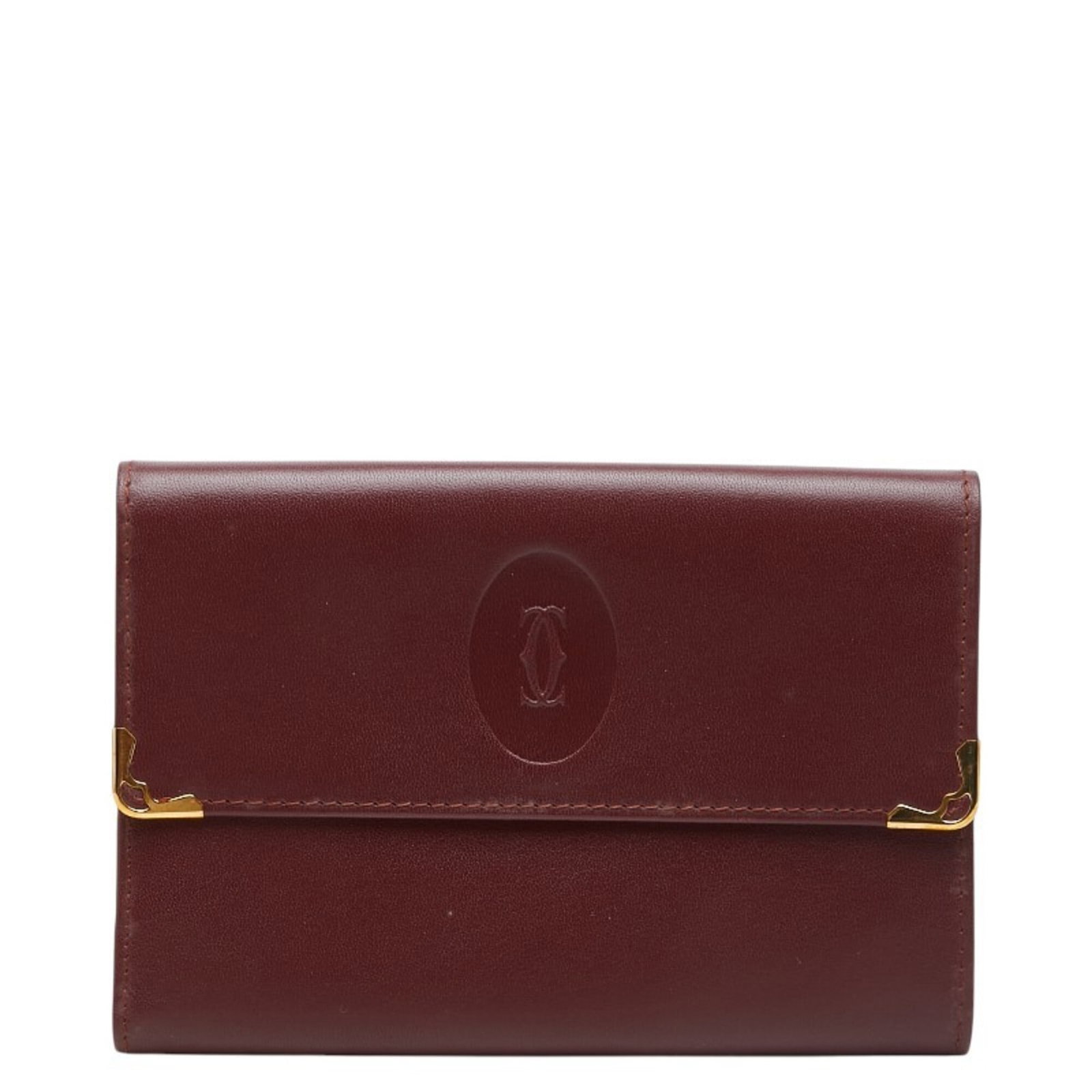Cartier Wallet (Tri-Fold) Leather: Cartier Wallet (Tri-Fold) Leather Bordeaux, a rich, wine red leather, adorns this elegant Cartier tri-fold wallet, crafted with precision and attention to detail. Measuring 10cm x 14cm x 2cm, its