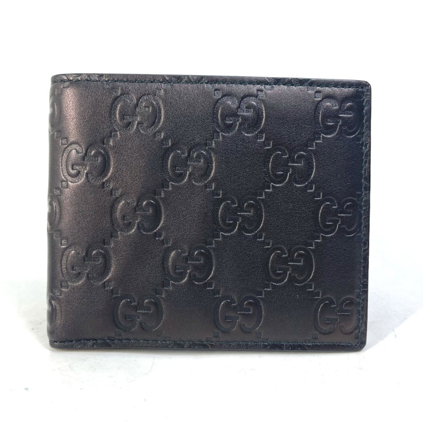 Gucci Wallet (Bi-Fold) Leather: Gucci Wallet (Bi-Fold) Leather The Gucci bi-fold leather wallet is a sleek and classic accessory, featuring a timeless black leather design. This wallet comes with its original box and dust bag for ad