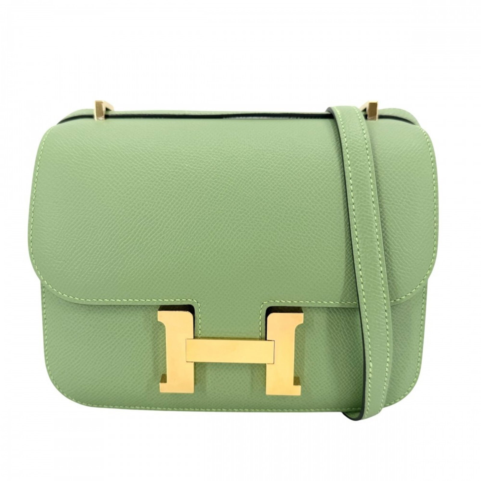Epsom Leather Shoulder Bag Pochette Hermes: Epsom Leather Shoulder Bag Pochette Hermes Epsom leather Pochette bag from Hermes, featuring a striking green color and compact size, measuring 14cm x 18cm x 5cm. This stylish shoulder bag showcases