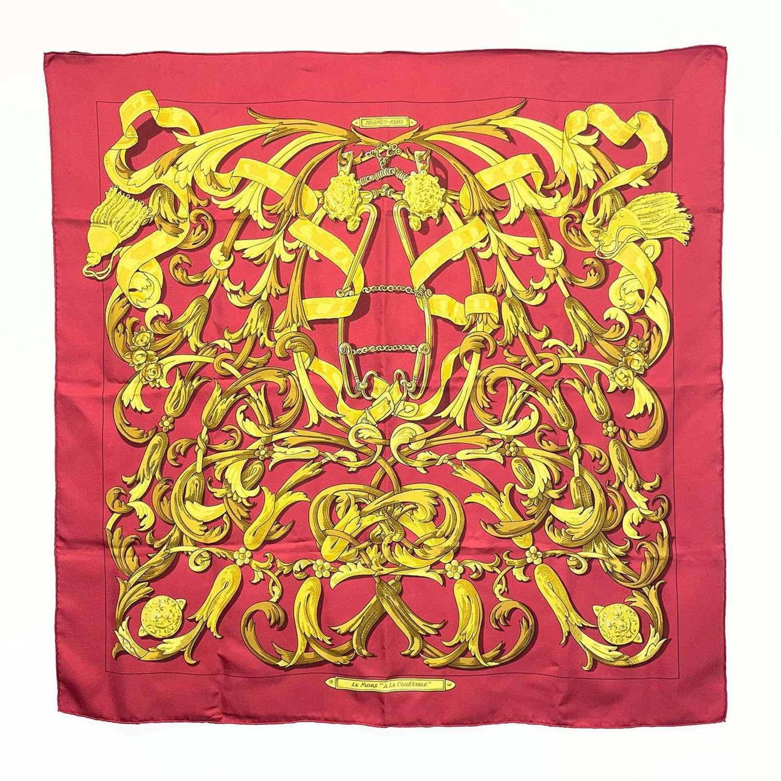 Silk Hermes Scarf: Silk Hermes Scarf Silk from France, this 88cm x 90cm scarf is made from high-quality silk and features a striking red color. Noted for its classic design and elegant proportions, this scarf is a