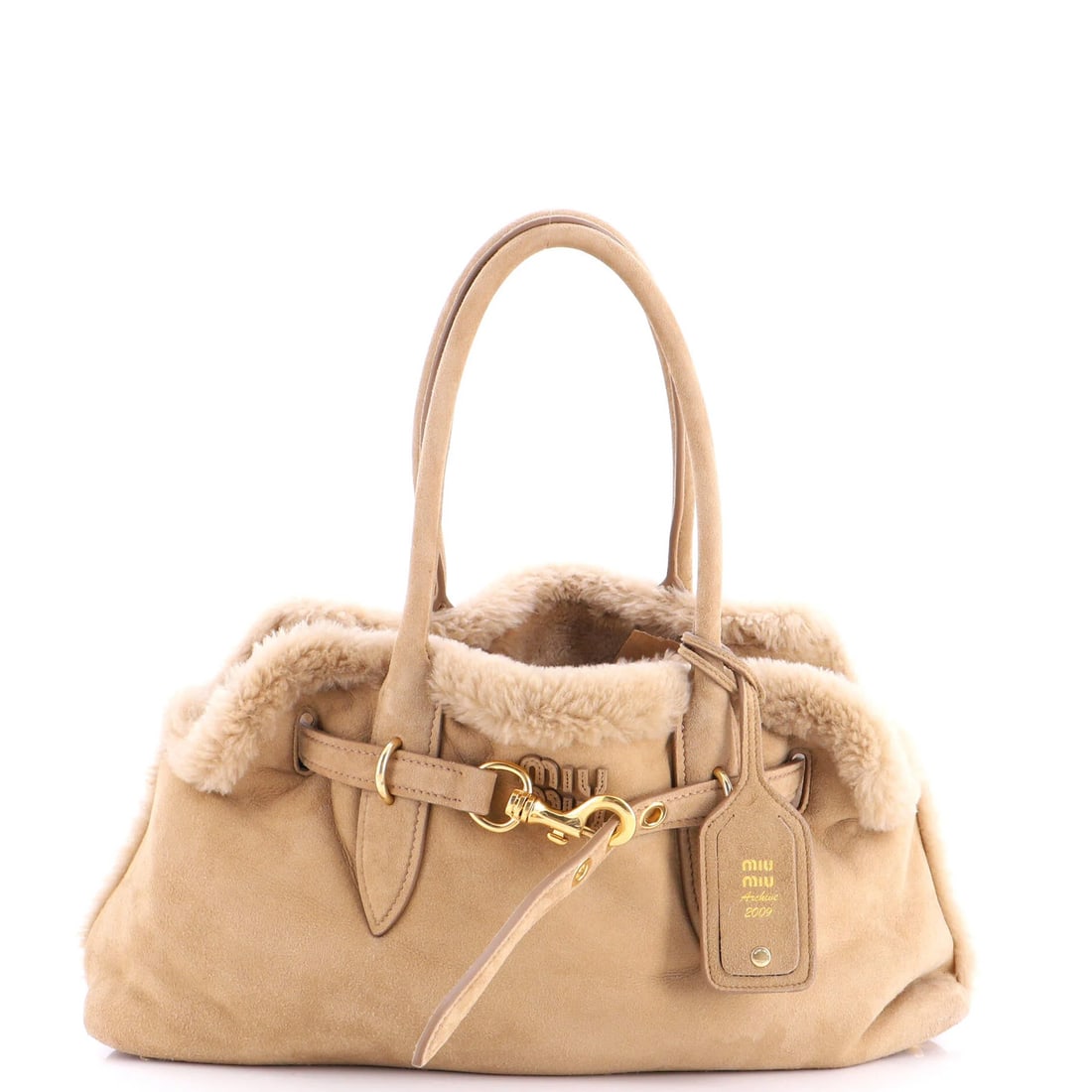 Shearling Suede Tote Miu Aventure: Shearling Suede Tote Miu Aventure Shearling Suede Tote Miu Aventure - A Luxurious Large Tote with Neutral Elegance. This Miu Miu Aventure tote features a neutral exterior made from high-quality