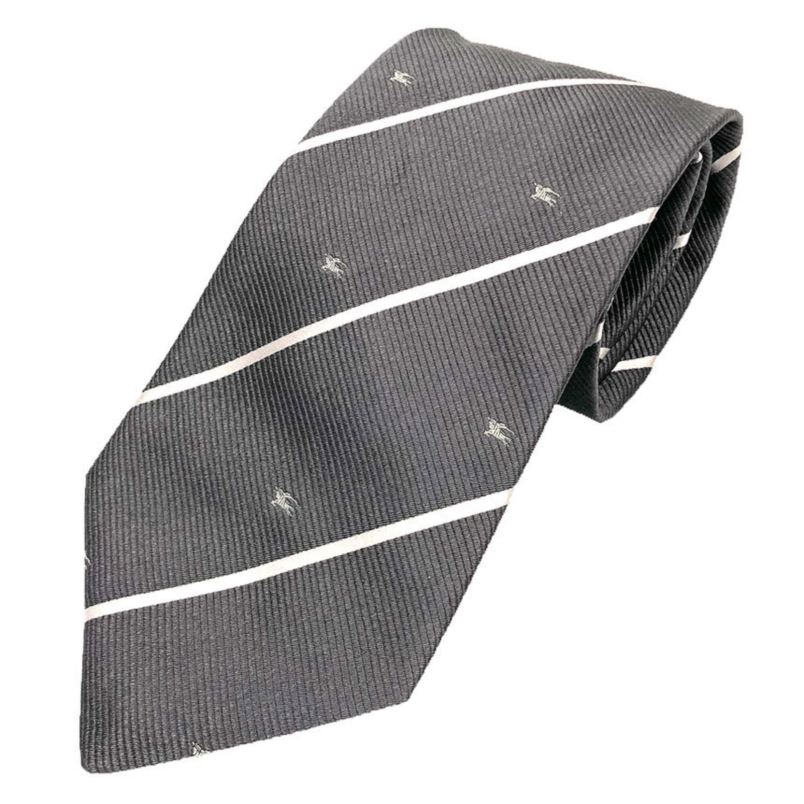 Burberry Cravat Silk: Burberry Cravat Silk Silk cravat from Burberry, featuring a classic gray color and a width of 9.5cm. Made from high-quality silk, this cravat is a stylish accessory for formal occasions. Item Specific