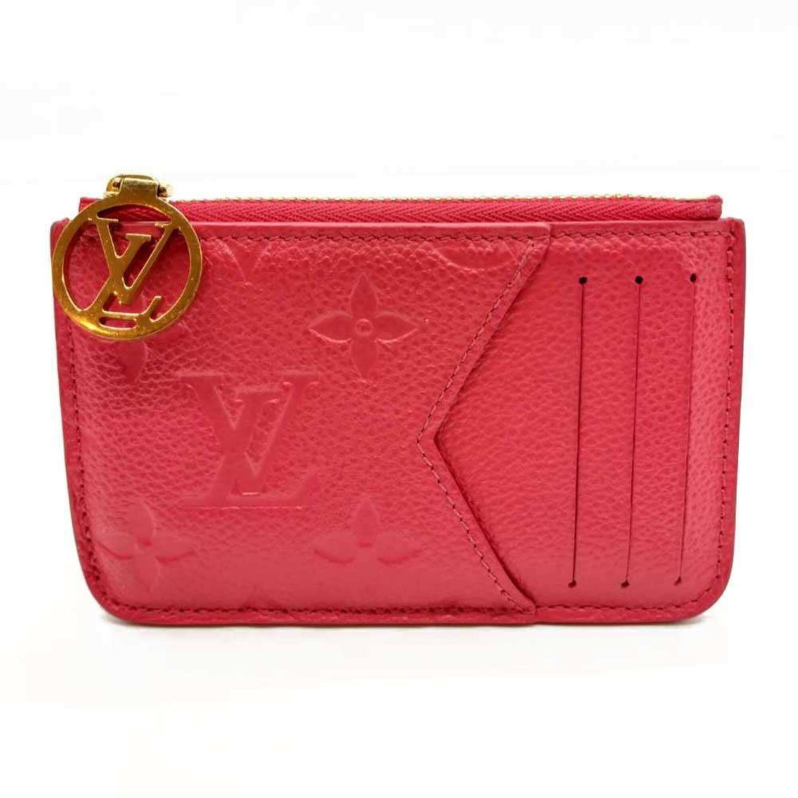 Louis Vuitton Purse Case Monogram Coin Empreinte: Louis Vuitton Purse Case Monogram Coin Empreinte Monogram Empreinte coin purse in a vibrant pink hue, adorned with the iconic Louis Vuitton monogram pattern. This stylish case features a zipper