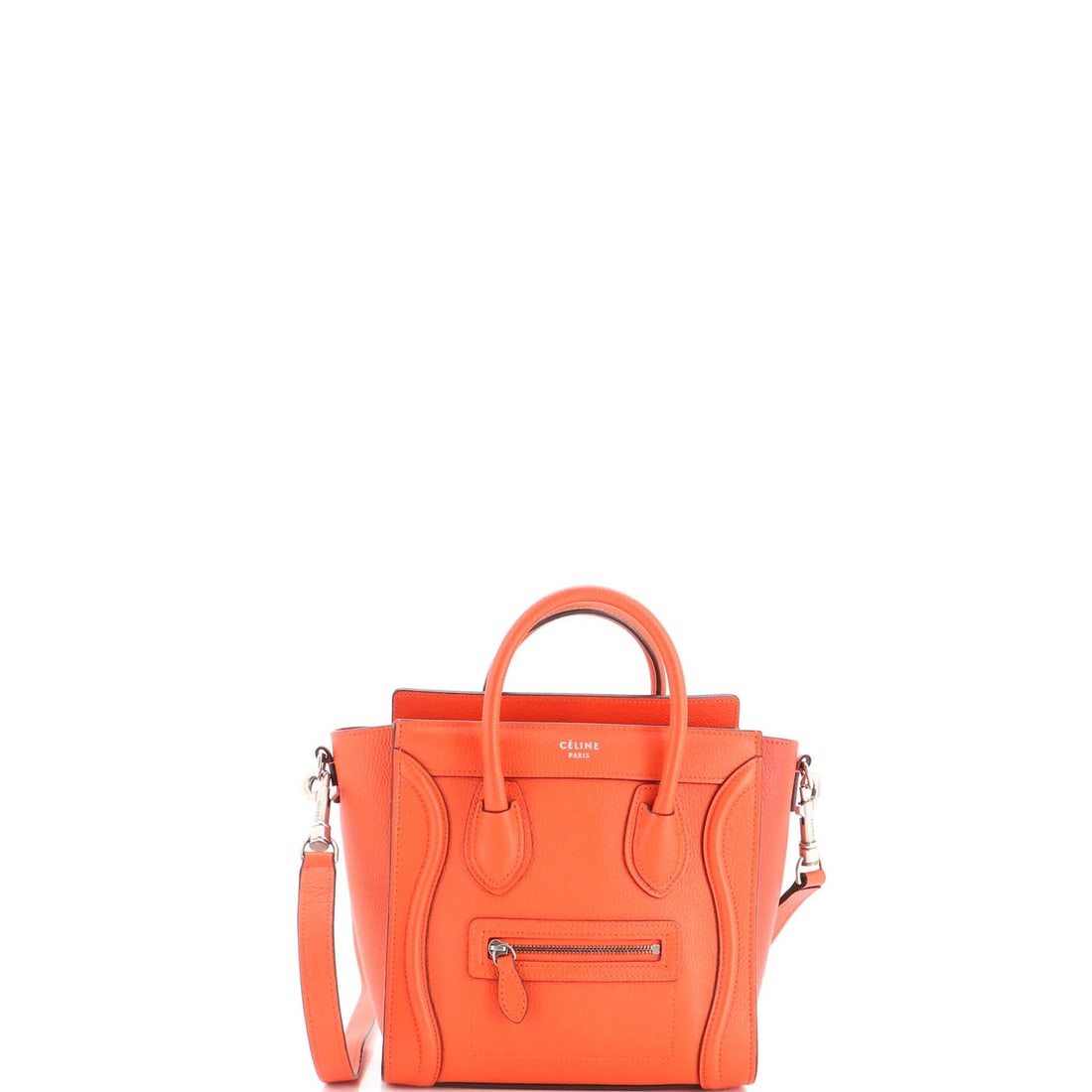 Luggage Bag Grainy Leather Nano Celine: Luggage Bag Grainy Leather Nano Celine The Celine Luggage Bag Grainy Leather Nano is a stylish and functional cross-body bag with a vibrant orange exterior. Measuring just 8" x 8" x 4", this compact