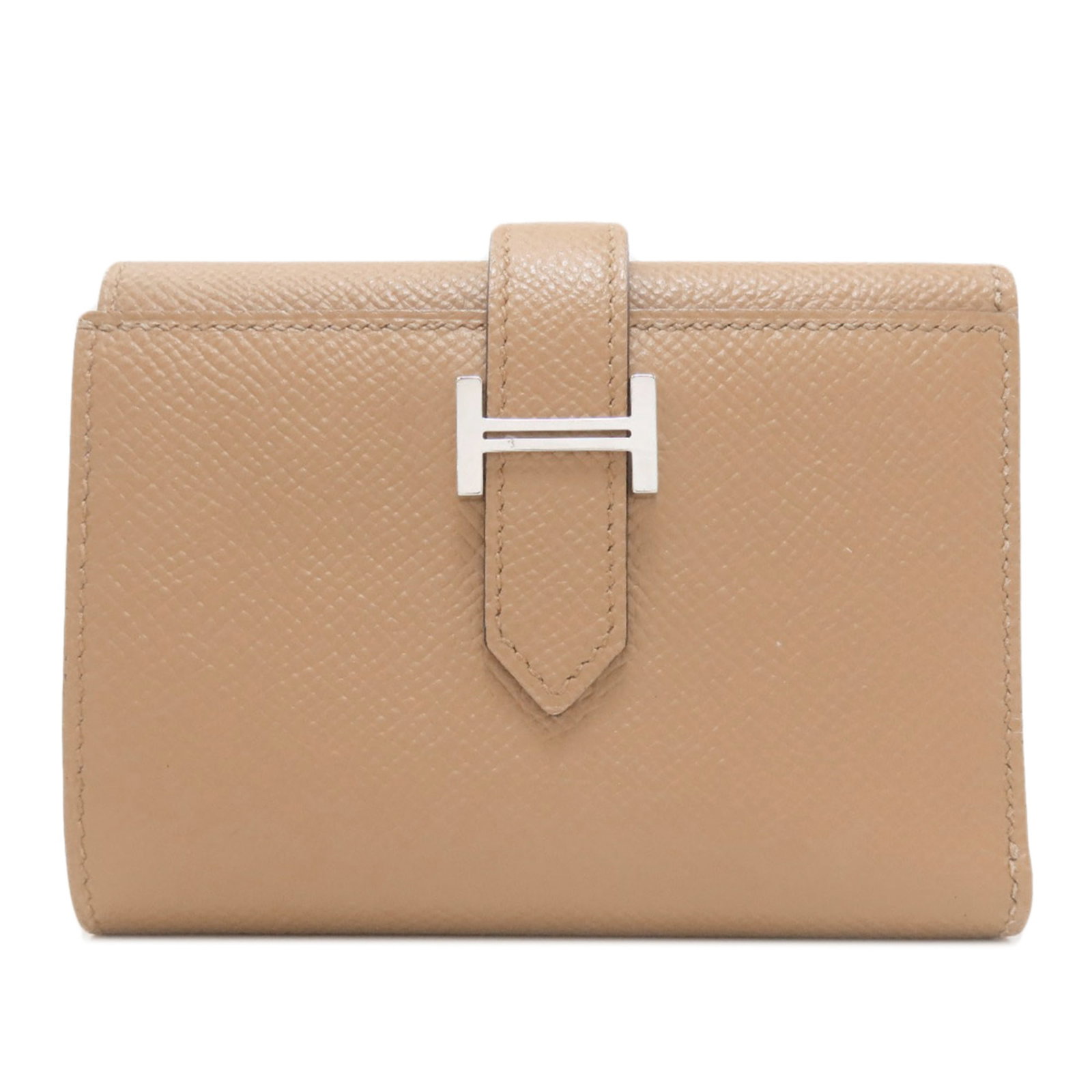 Bi fold Epsom Leather Hermes Wallet: Bi fold Epsom Leather Hermes Wallet Epsom leather, a luxurious material, is used to craft this bi-fold wallet from the renowned brand Hermes. The wallet's compact size and elegant design make it a sty