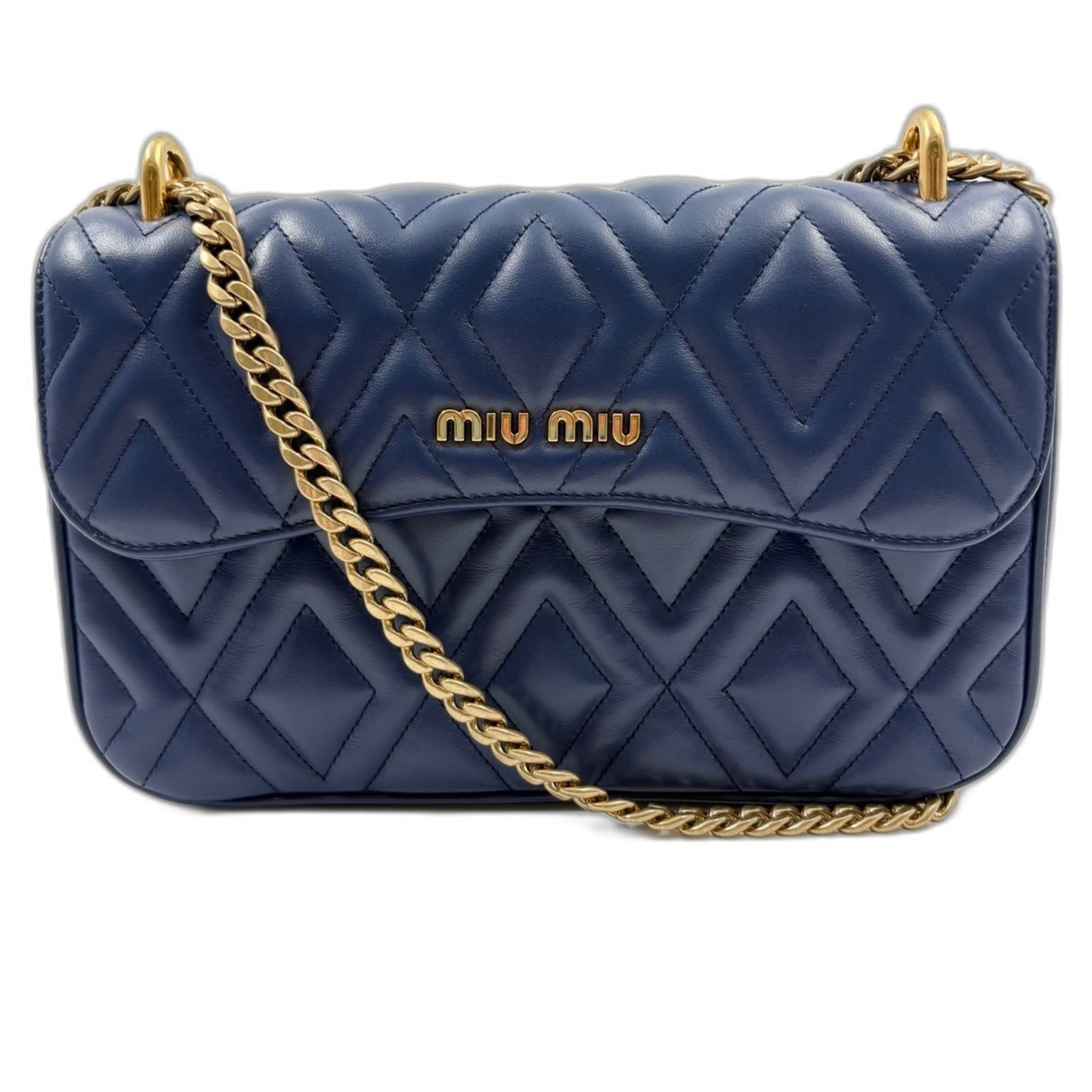 Shoulder Miu Handbag: Shoulder Miu Handbag The Miu Miu Matelasse Shoulder Bag boasts a striking blue hue and a versatile design, with a spacious interior and adjustable strap length to fit any style. Measuring 16cm x 25cm
