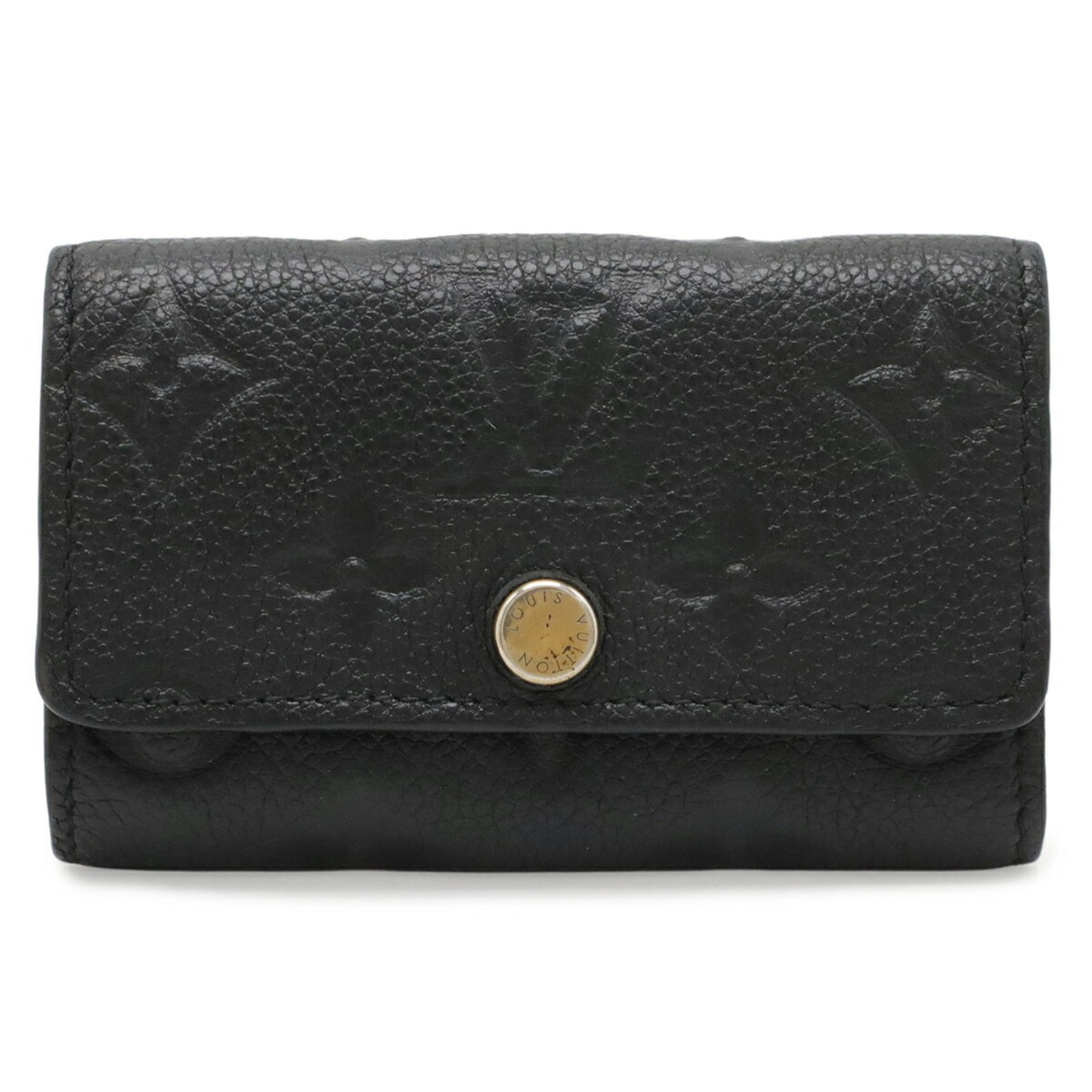 Keycase Monogram Louis Vuitton Empreinte: Keycase Monogram Louis Vuitton Empreinte Black Louis Vuitton Empreinte keycase with a classic design and iconic monogram pattern. Made from high-quality materials, this keycase measures 7cm x 10.5cm