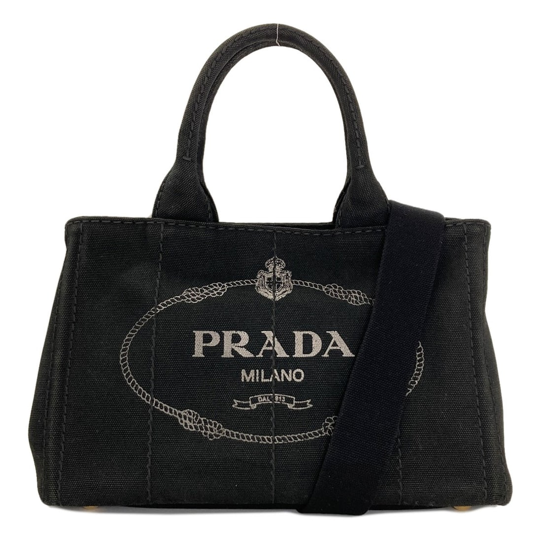 Mini Handbag Canvas 2 Way Prada: Mini Handbag Canvas 2 Way Prada Canvas 2 Way Prada Mini Handbag in Black. This mini handbag features a canvas exterior and detachable strap, showcasing a sleek and versatile design. With its black