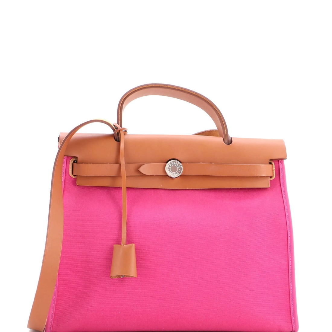 Herbag Hermes Leather Toile 31 Zip: Herbag Hermes Leather Toile 31 Zip The Herbag Hermes Leather Toile 31 Zip is a stylish and functional shoulder bag featuring a pink leather exterior with a canvas plain interior. Notable details