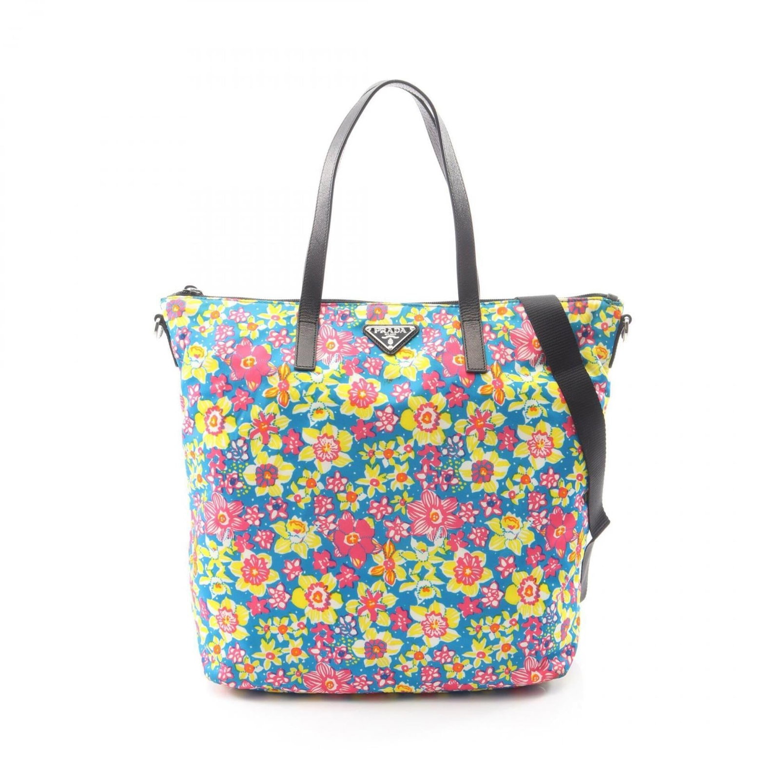 Nylon Leather Tote Prada Handbag: Nylon Leather Tote Prada Handbag Saffiano leather, a durable and versatile material, is used to create the exterior of this Prada tote bag. The bag's unique multi-color design adds a touch of personal