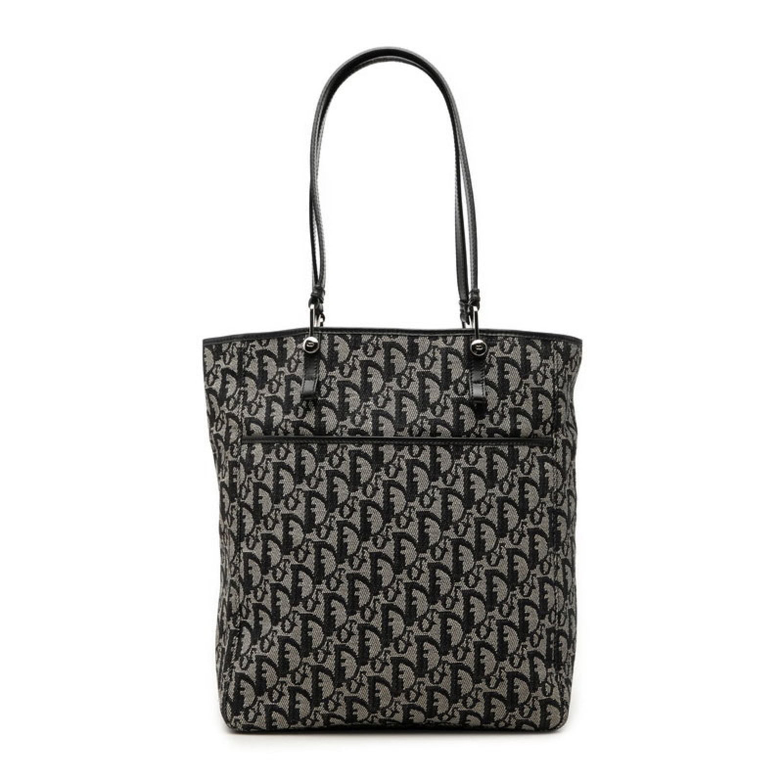 Canvas Leather Dior Handbag Tote Christian: Canvas Leather Dior Handbag Tote Christian Canvas Leather Dior Handbag Tote Christian - A navy canvas and leather tote bag bearing the signature of Christian Dior, measuring 23cm x 25.5cm x 11.5cm.