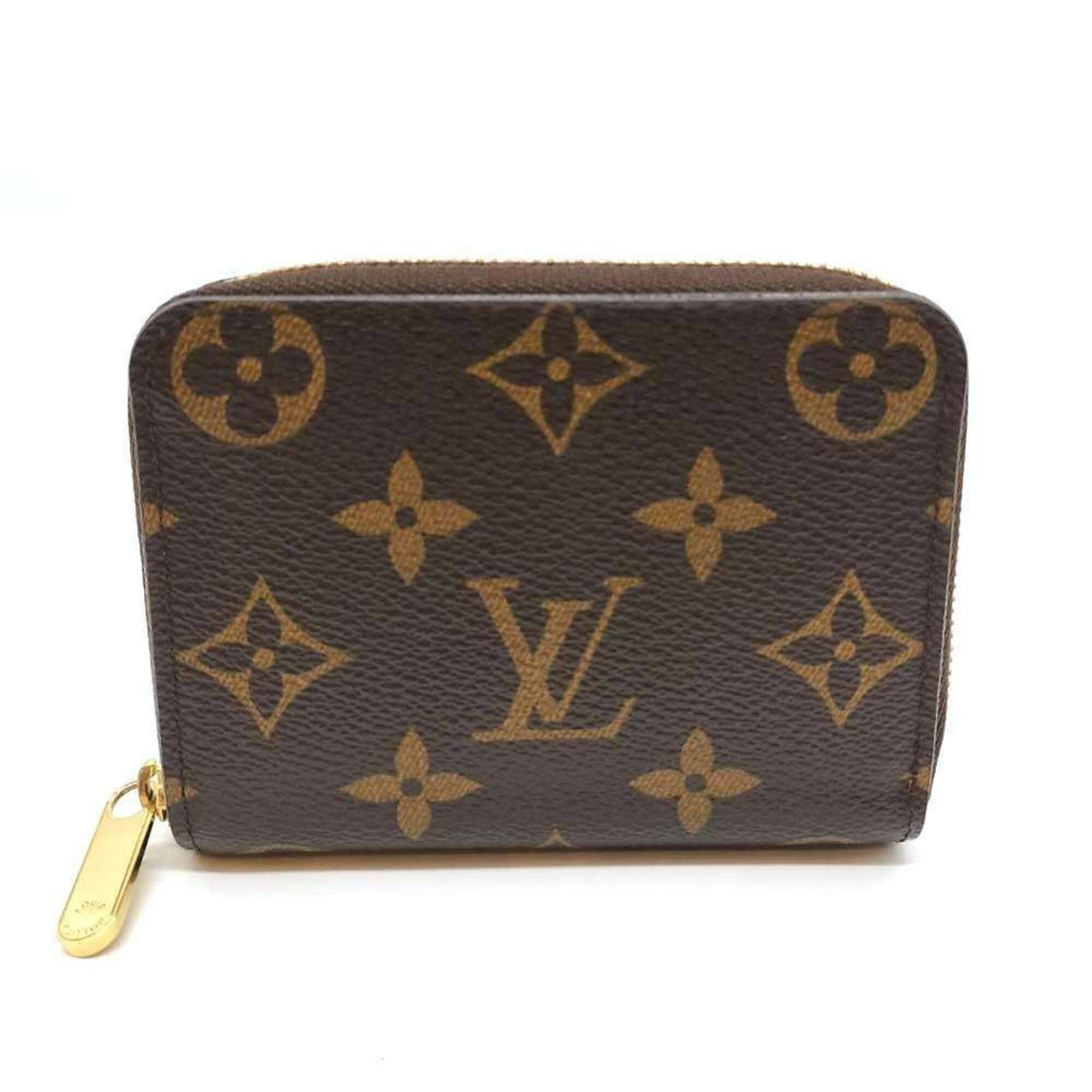 Coin purse Monogram Louis Vuitton: Coin purse Monogram Louis Vuitton The Louis Vuitton Monogram Coin Purse is a stylish and compact accessory, featuring the iconic monogram pattern in rich brown. Made from high-quality materials, this