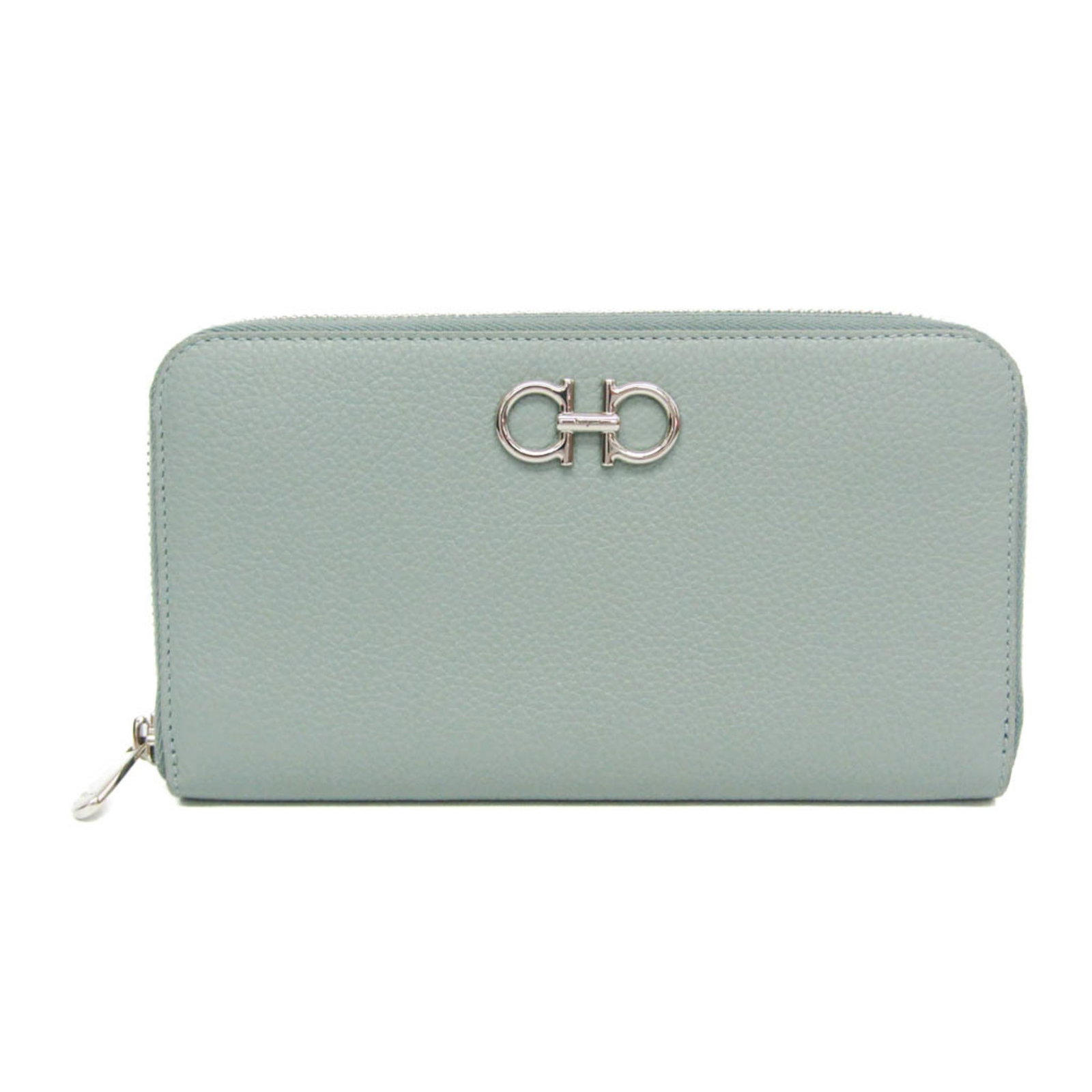 Salvatore Ferragamo Long Wallet (Bi-Fold) Leather: Salvatore Ferragamo Long Wallet (Bi-Fold) Leather The Salvatore Ferragamo Long Wallet in Light Green Leather is a stylish and functional accessory. This bi-fold wallet features a zipper closure, multi