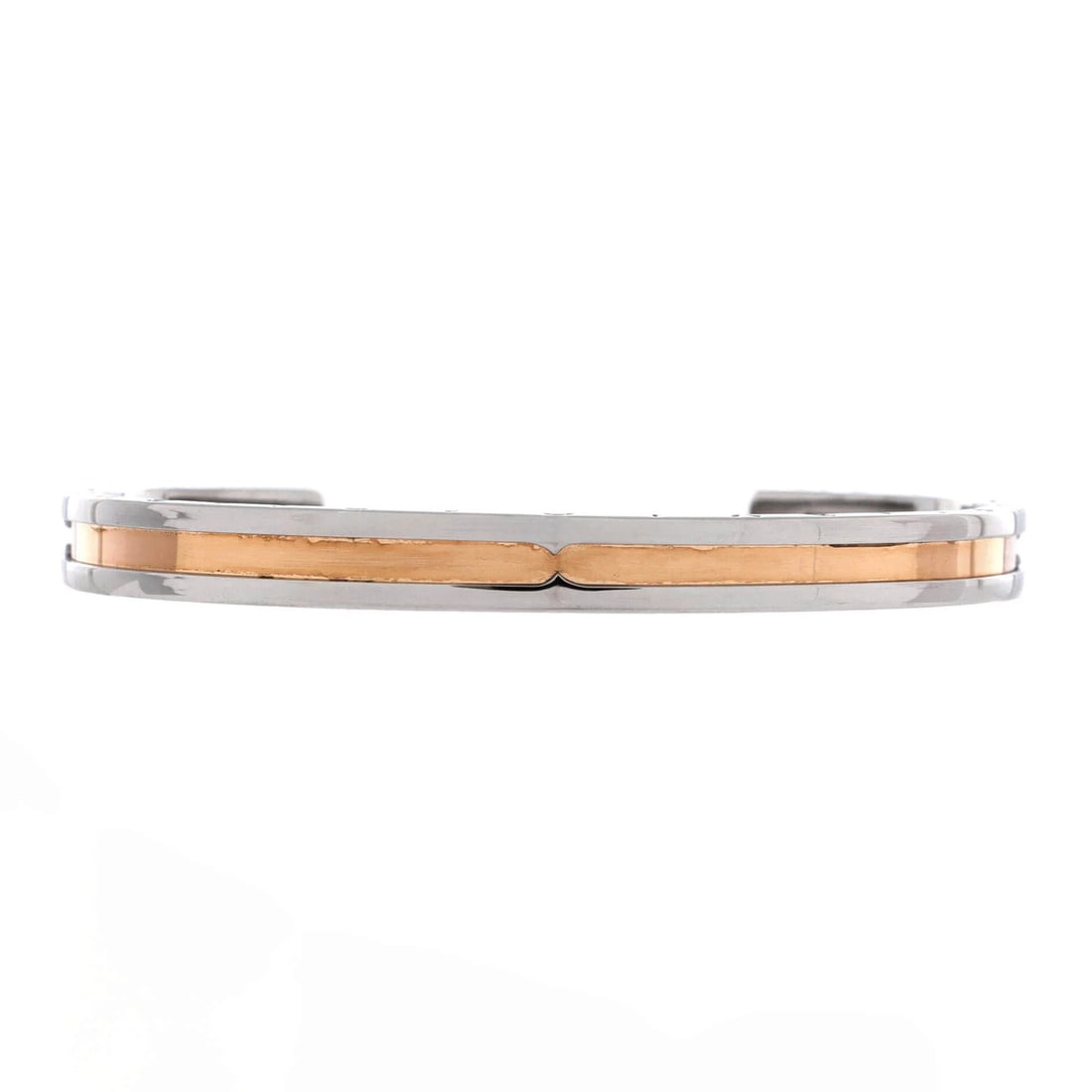 Bvlgari B.Zero1 Cuff Bracelet Stainless Steel and 18K Rose Gold: Bvlgari B.Zero1 Cuff Bracelet Stainless Steel and 18K Rose Gold Bvlgari's B.Zero1 Cuff Bracelet is a statement piece featuring 18K Rose Gold and Stainless Steel, with a sleek silver exterior. This