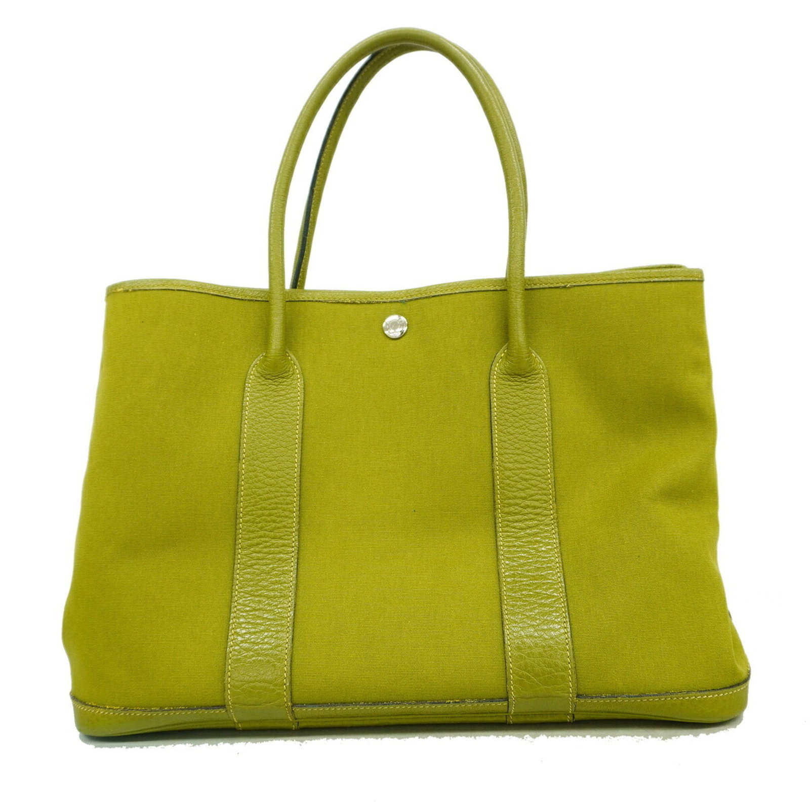 Officier Tote Bag Hermes Toile: Officier Tote Bag Hermes Toile The Hermes Toile tote bag is a stylish and functional accessory, boasting the iconic Toile officier design in a vibrant green hue. Measuring 26.5cm x 36cm x 17.5cm,