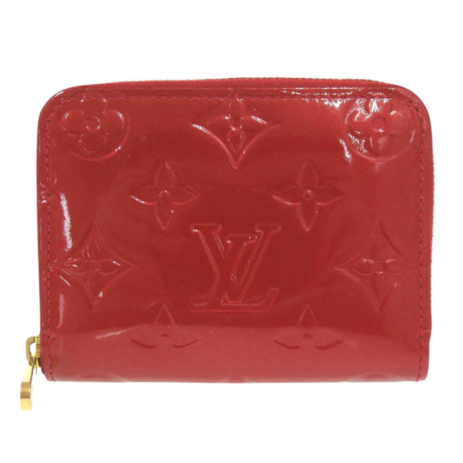 Louis Vuitton Monogram Vernis Coin Case Purse: Louis Vuitton Monogram Vernis Coin Case Purse The Louis Vuitton Monogram Vernis Coin Case Purse is a stylish and compact accessory, featuring the iconic Monogram Vernis pattern in a vibrant red