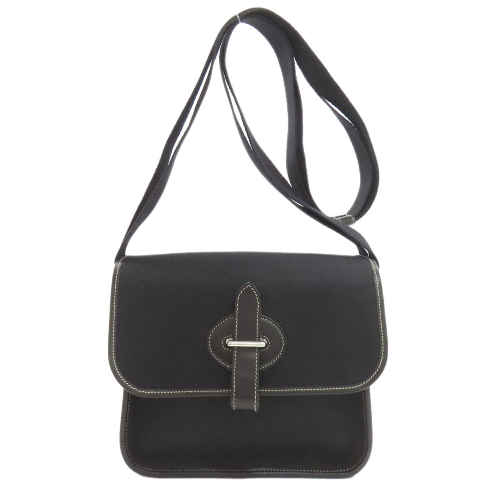 Handbag Hermes: Handbag Hermes Black Hermes handbag with dimensions 20cm x 24cm x 5cm, featuring a sleek design and classic style. The bag's compact size makes it easy to carry, while its timeless design ensures it