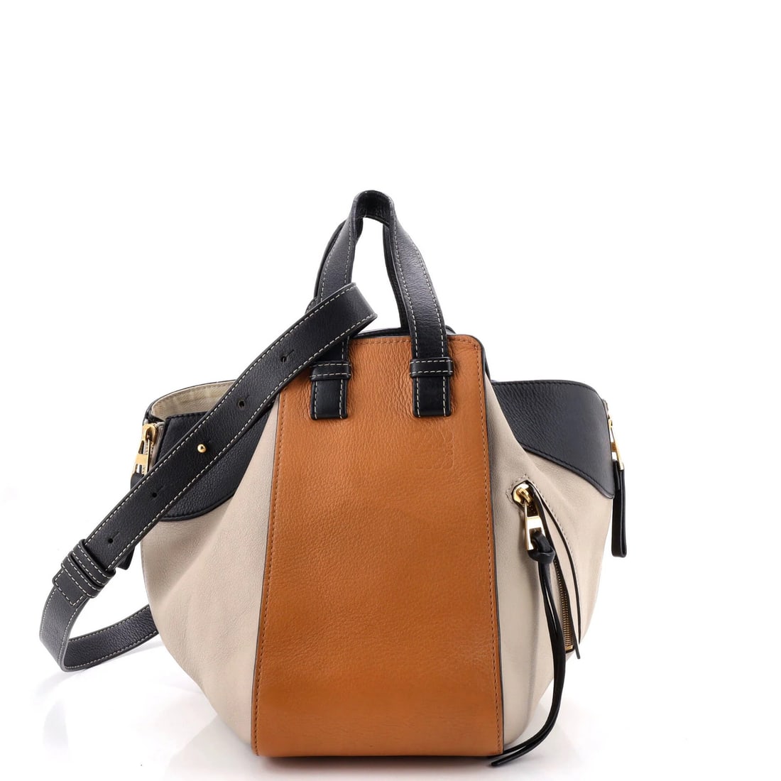 Small Leather Bag Hammock Loewe: Small Leather Bag Hammock Loewe Small Leather Bag Hammock Loewe features a unique multicolor exterior and neutral interior, with a gold hardware accent. Measuring 10" tall, 11" wide, and 5.5" deep,