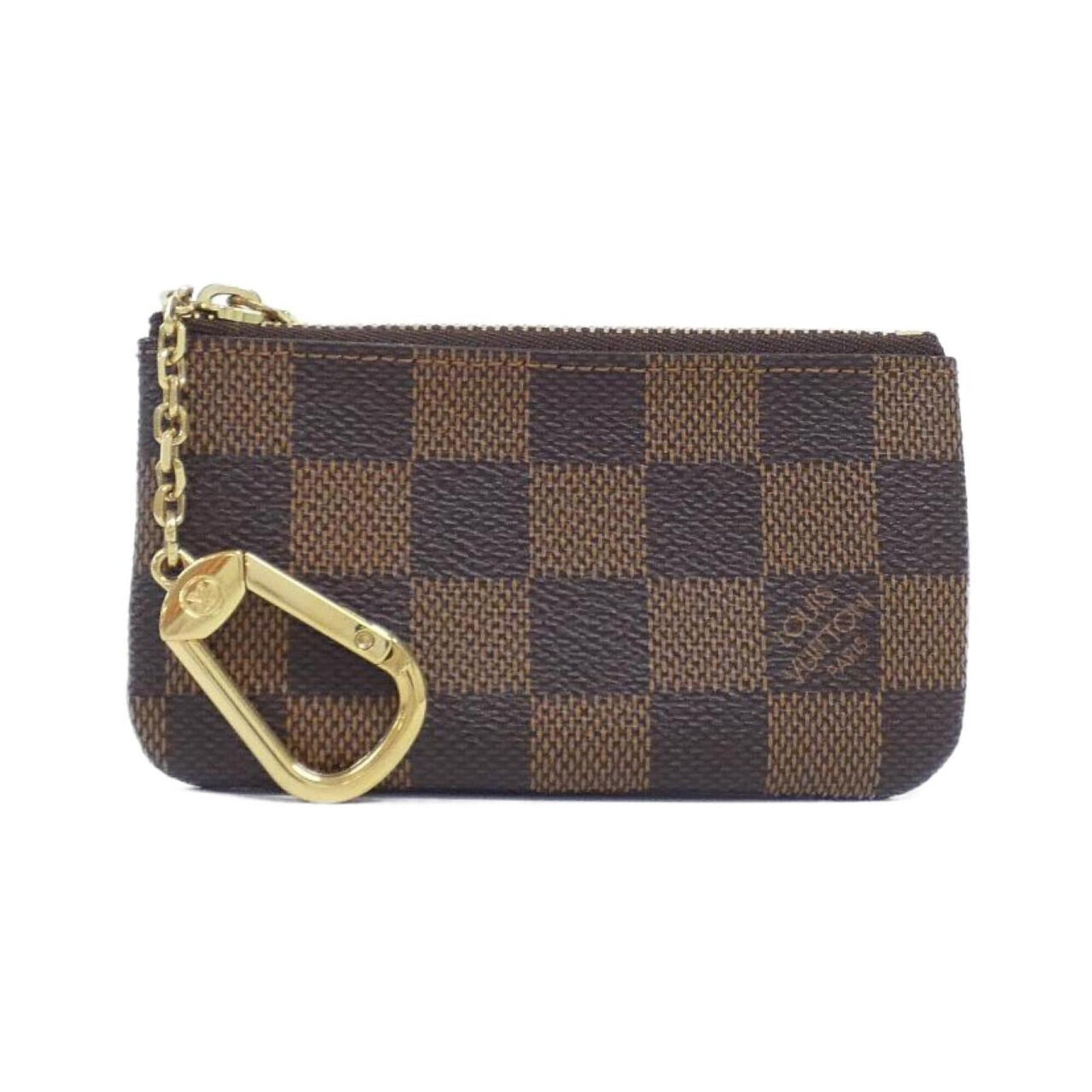 Louis Vuitton Coin Purse/ Coin Case Coated Canvas: Louis Vuitton Coin Purse/ Coin Case Coated Canvas Coated canvas construction provides a durable and stylish finish for this Louis Vuitton coin purse. The Ebene color and classic Damier pattern make