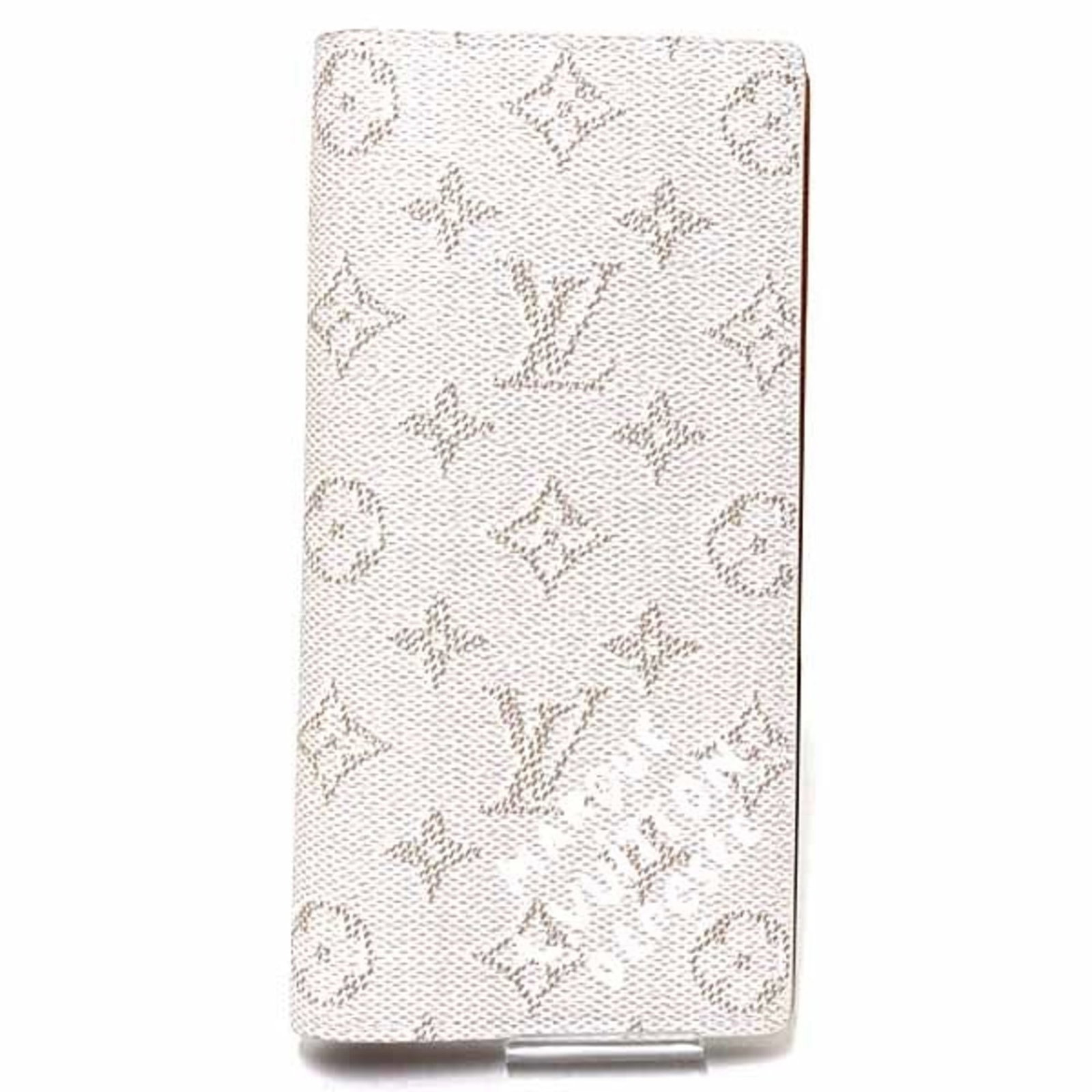 Leather Wallet Bi Fold Louis Vuitton: Leather Wallet Bi Fold Louis Vuitton This Louis Vuitton bi-fold wallet features the iconic Monogram pattern, crafted from high-quality white cowhide leather. The sleek design and classic style make