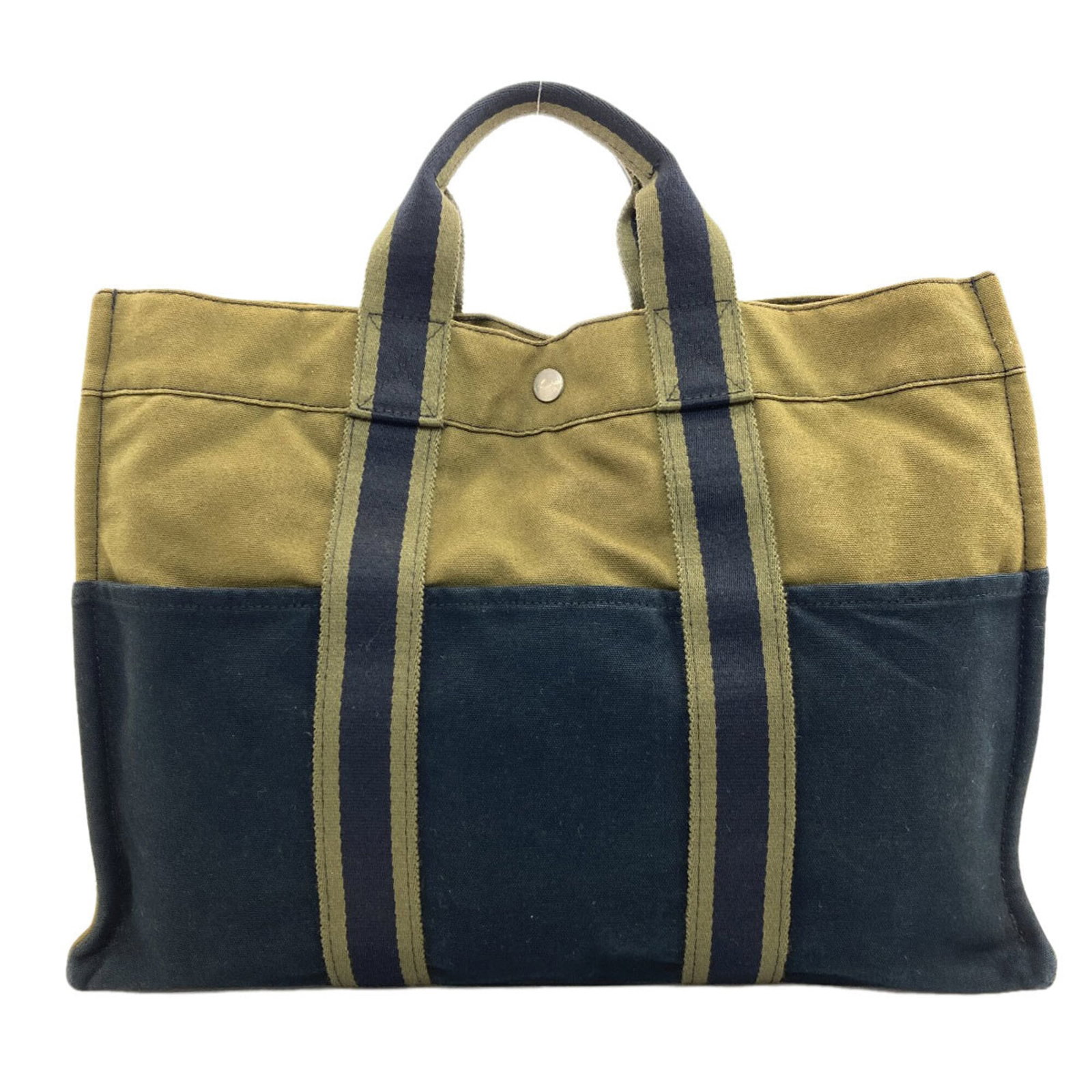 Handbag Canvas: Handbag Canvas Canvas Handbag from Hermes. This black canvas handbag features a 30.5cm x 43cm x 10cm size and a 25cm long handle, making it a stylish and practical accessory. The bag's canvas