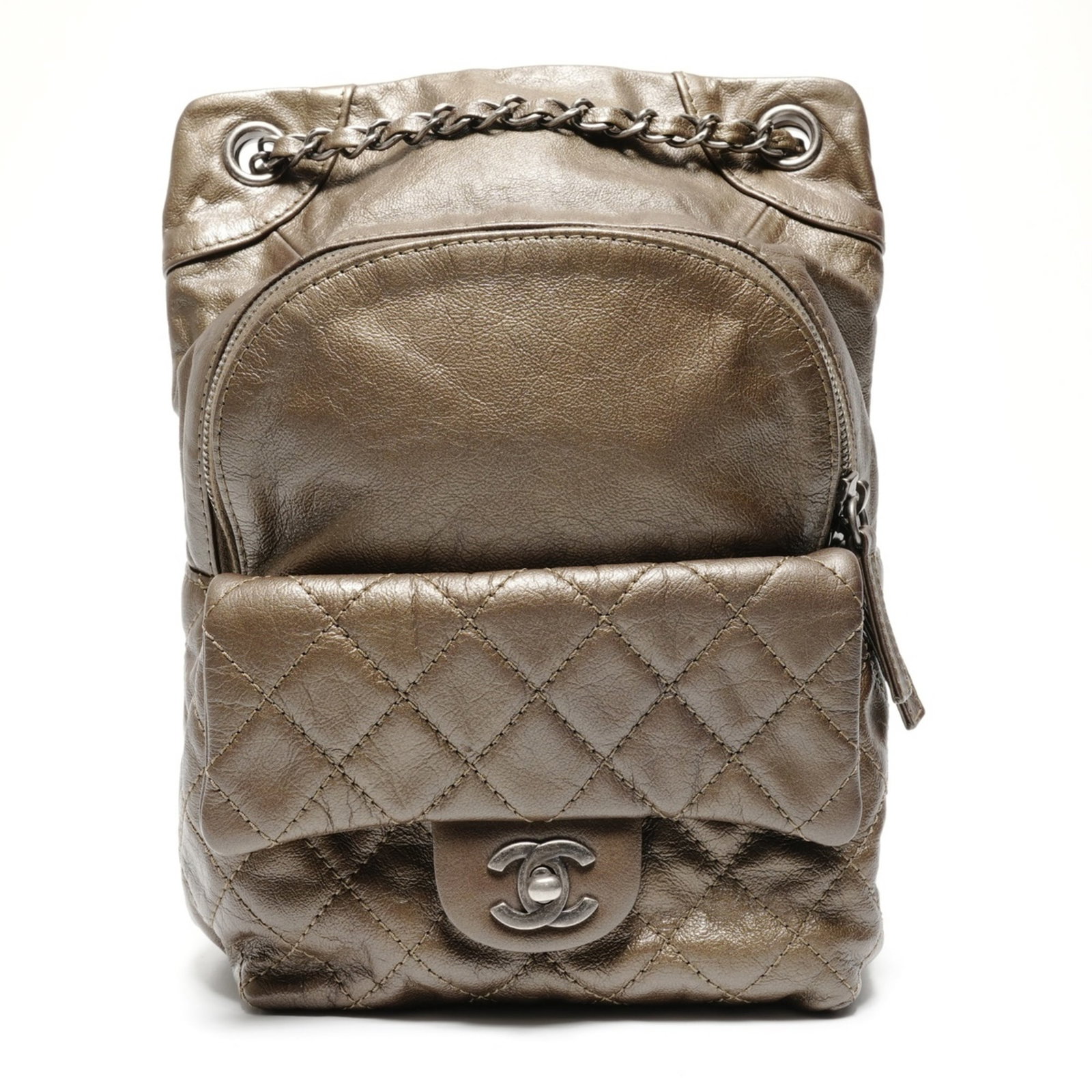 Backpack Leather By Chanel: Backpack Leather By Chanel Leather backpack from the iconic Chanel Matelasse line, crafted from high-quality lambskin leather. Featuring a classic khaki color and adjustable straps, this timeless